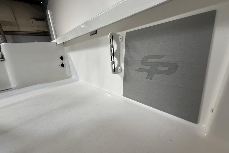 2026 Sea Pro 250 Bay boat interior with logo detail.