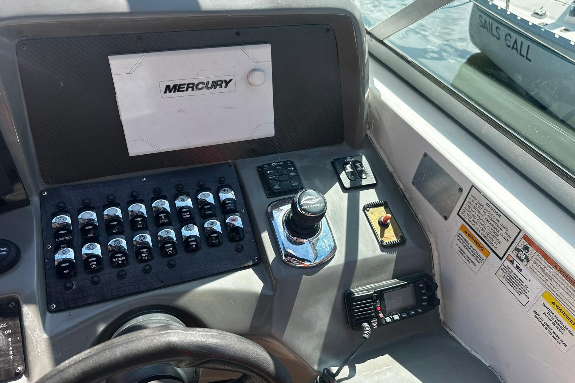 Control panel of a 2012 Rinker 310 Express Cruiser LE boat.