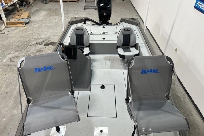 2026 SeaArk Flex 19 Pro boat interior with seating and storage compartments.