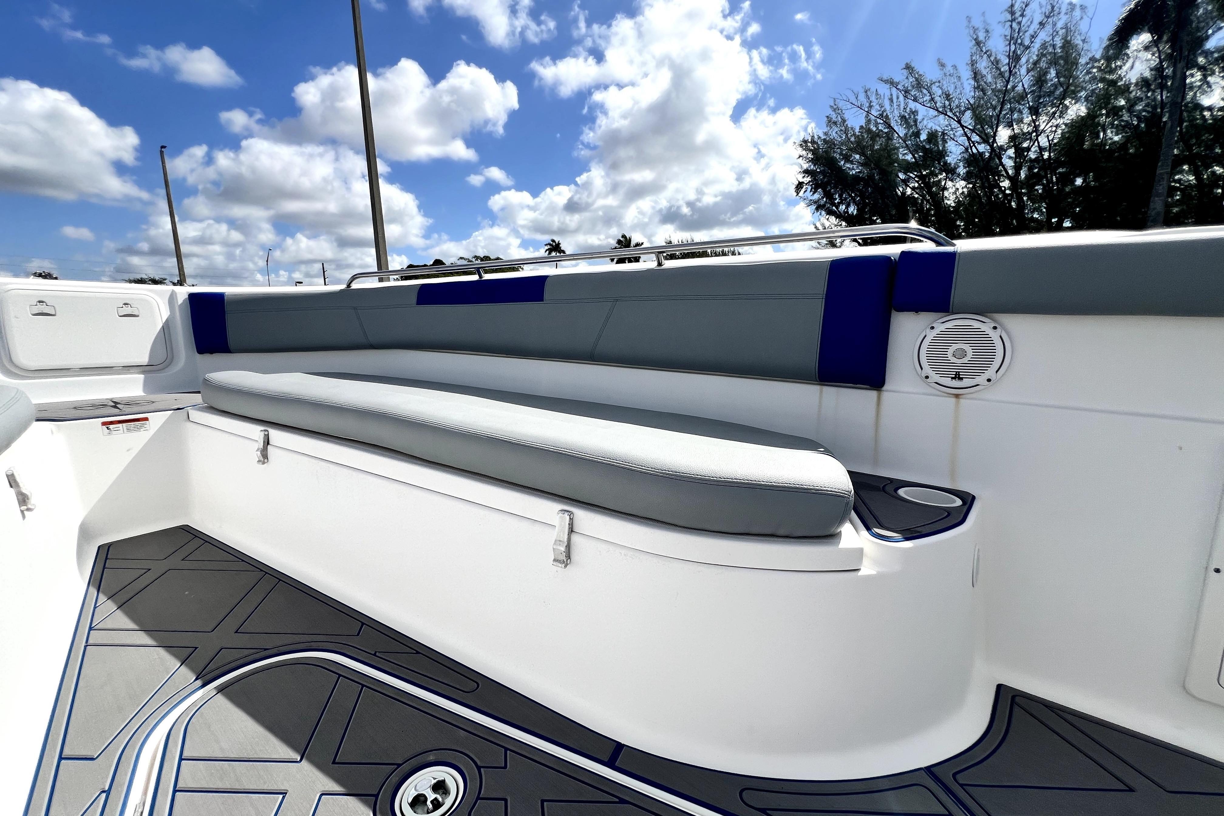 2007 Wellcraft 35 Scarab Sport Open boat interior with cushioned seating and speaker.