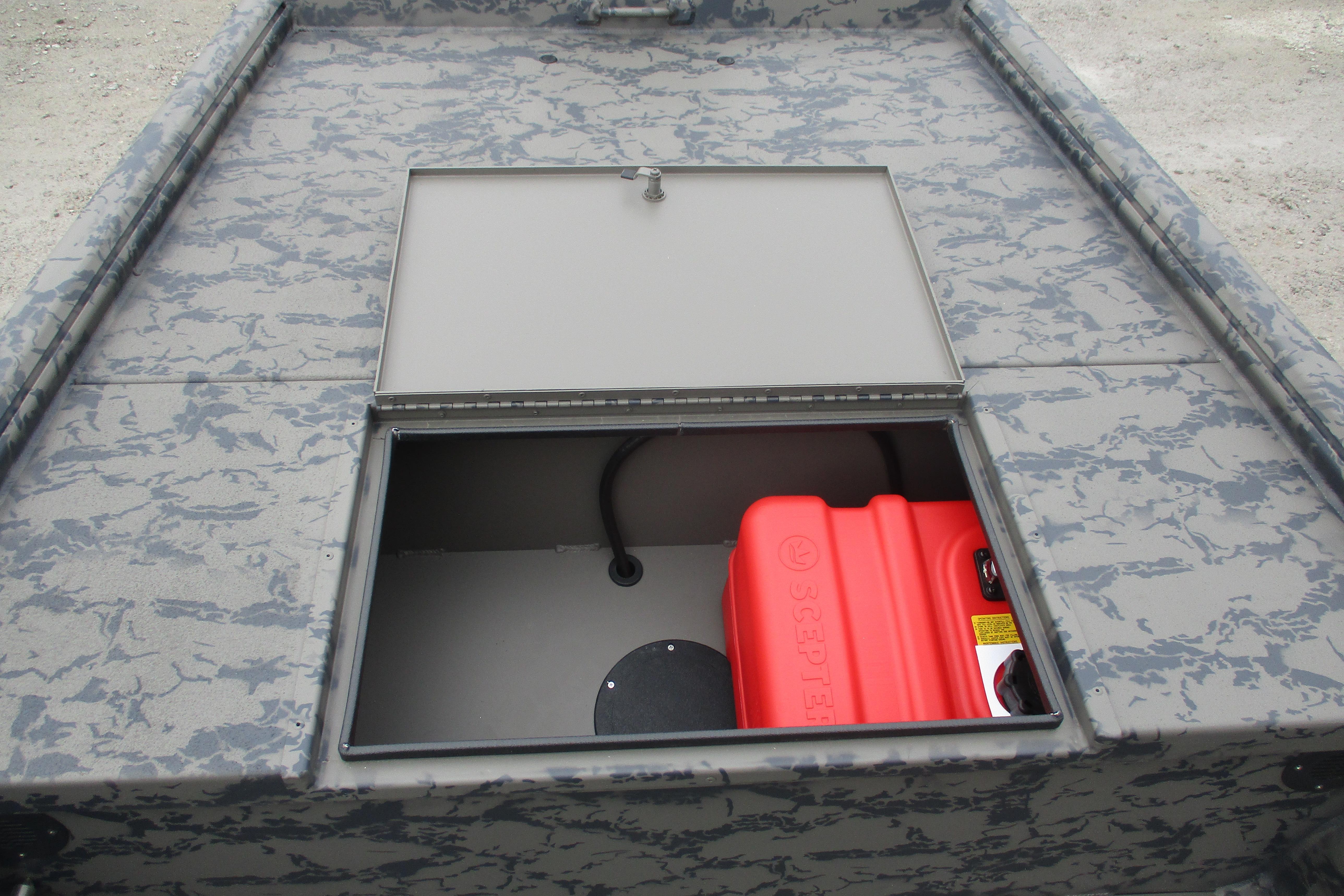 2026 Gator Tail 1754 Extreme boat storage compartment with red fuel tank.