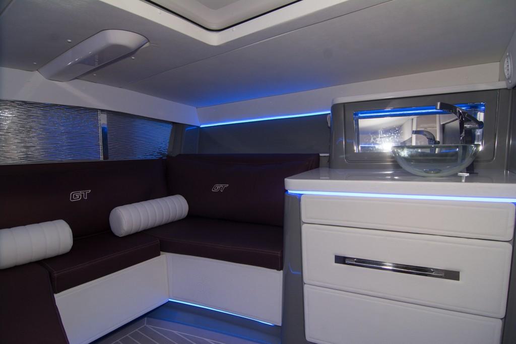 2019 Donzi 41 GT interior with modern seating and kitchenette.