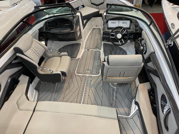 2025 Monterey 218 SS boat interior with modern seating and sleek dashboard design.
