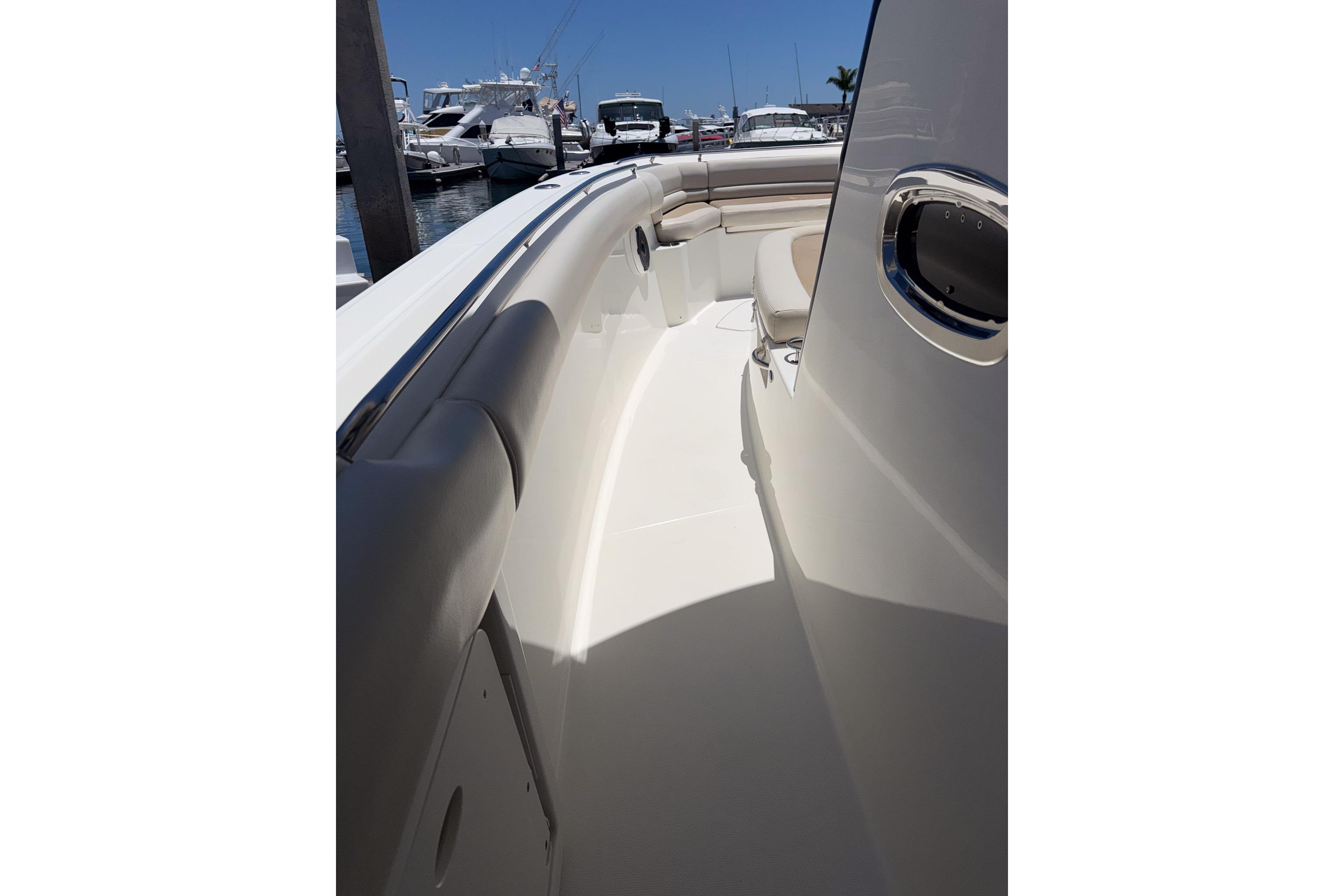 2021 Boston Whaler 330 Outrage boat interior, featuring sleek seating and modern design.