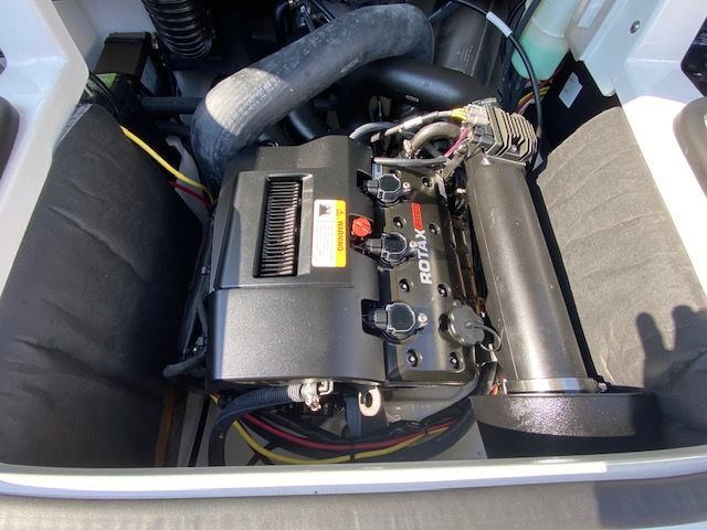 Engine compartment of a 2024 Scarab 195 ID featuring a Rotax engine.