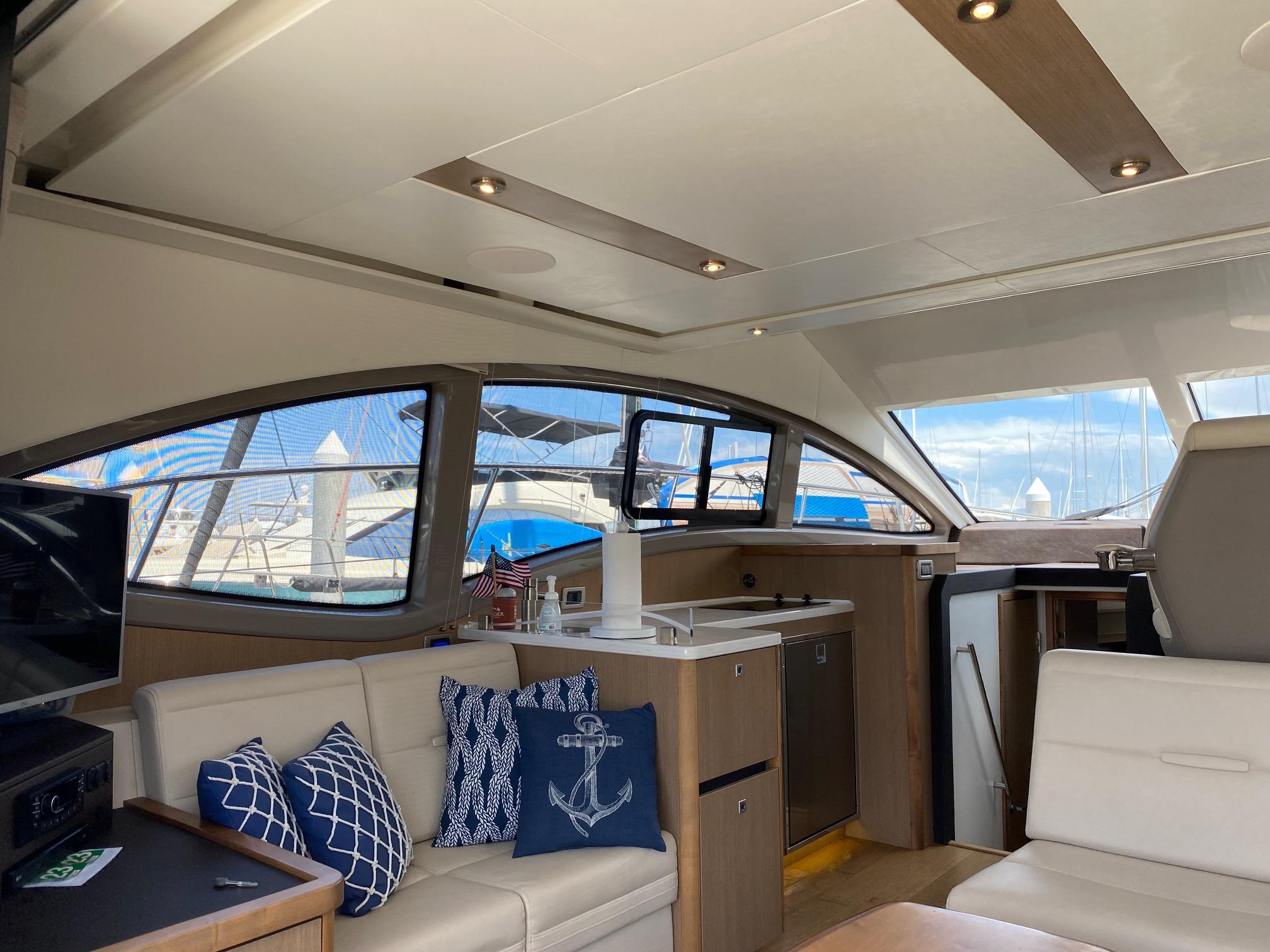 Interior of 2018 Sea Ray 400 Fly yacht with modern furnishings and nautical decor.