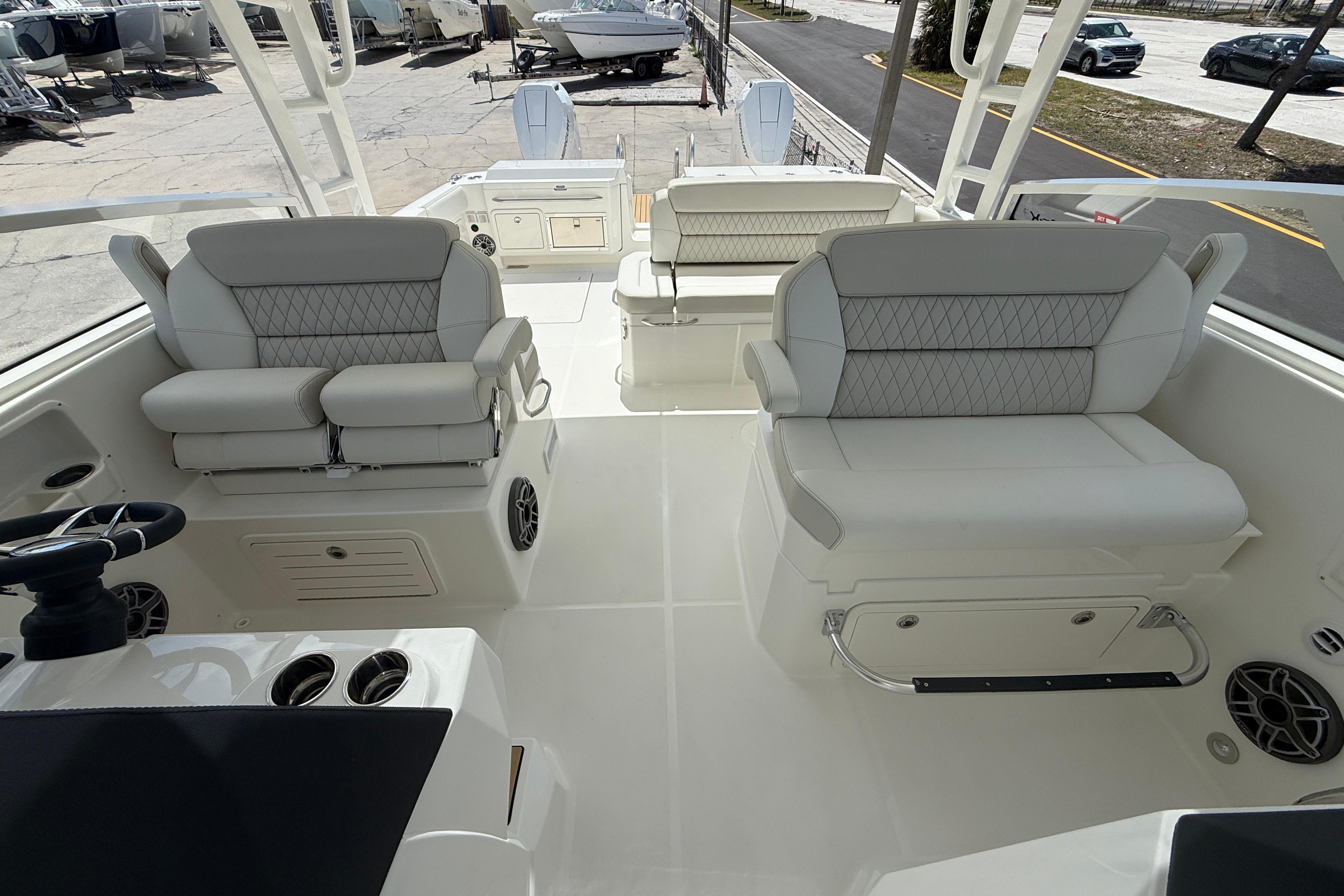 2026 World Cat 400 DC-X Island boat interior with luxurious seating and modern design.
