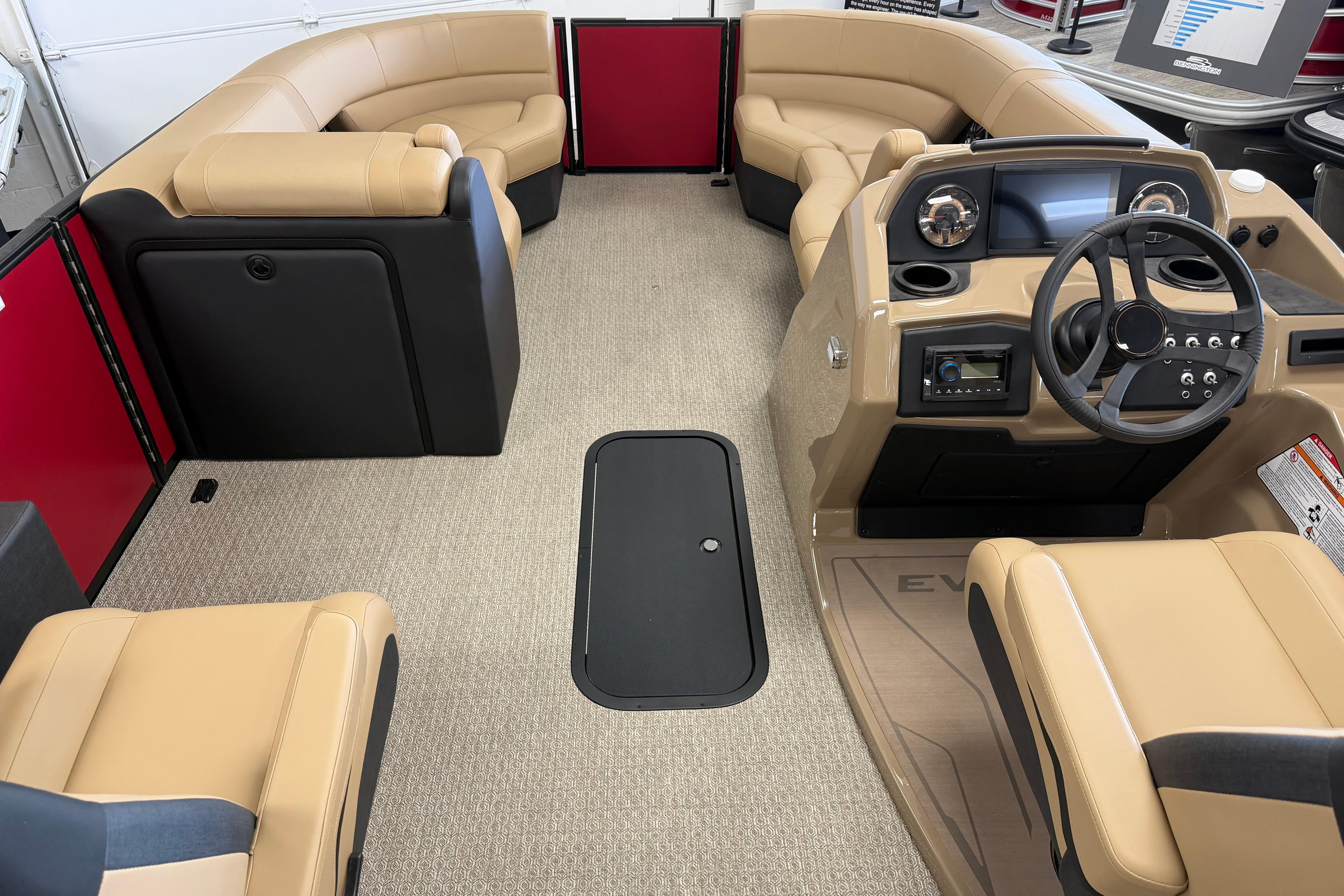 Luxurious interior of 2026 Evotti 523CS boat with plush seating and modern dashboard.