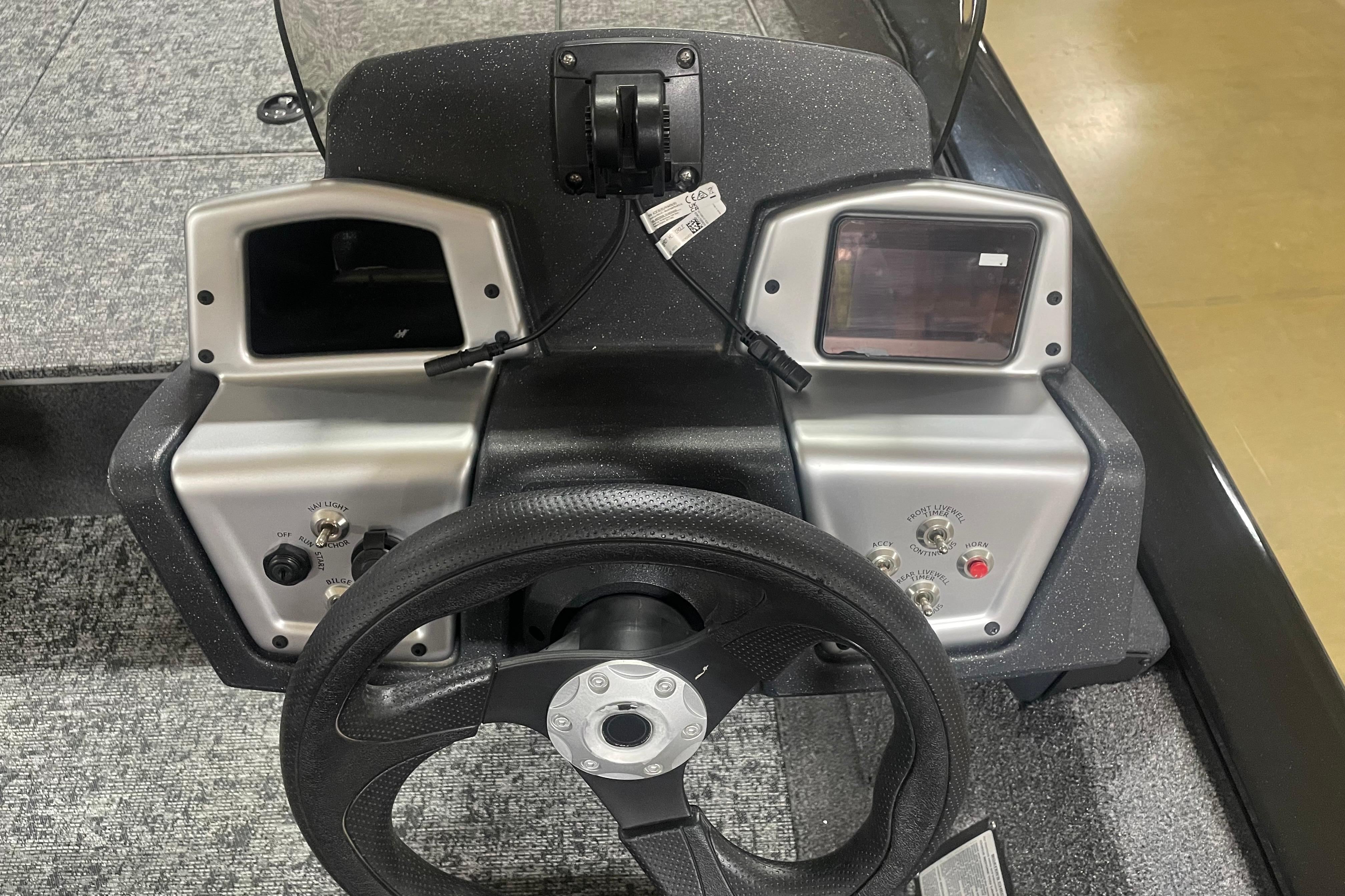 Steering console of 2026 Tracker Pro Team 175 Crappie Edition boat with controls and displays.