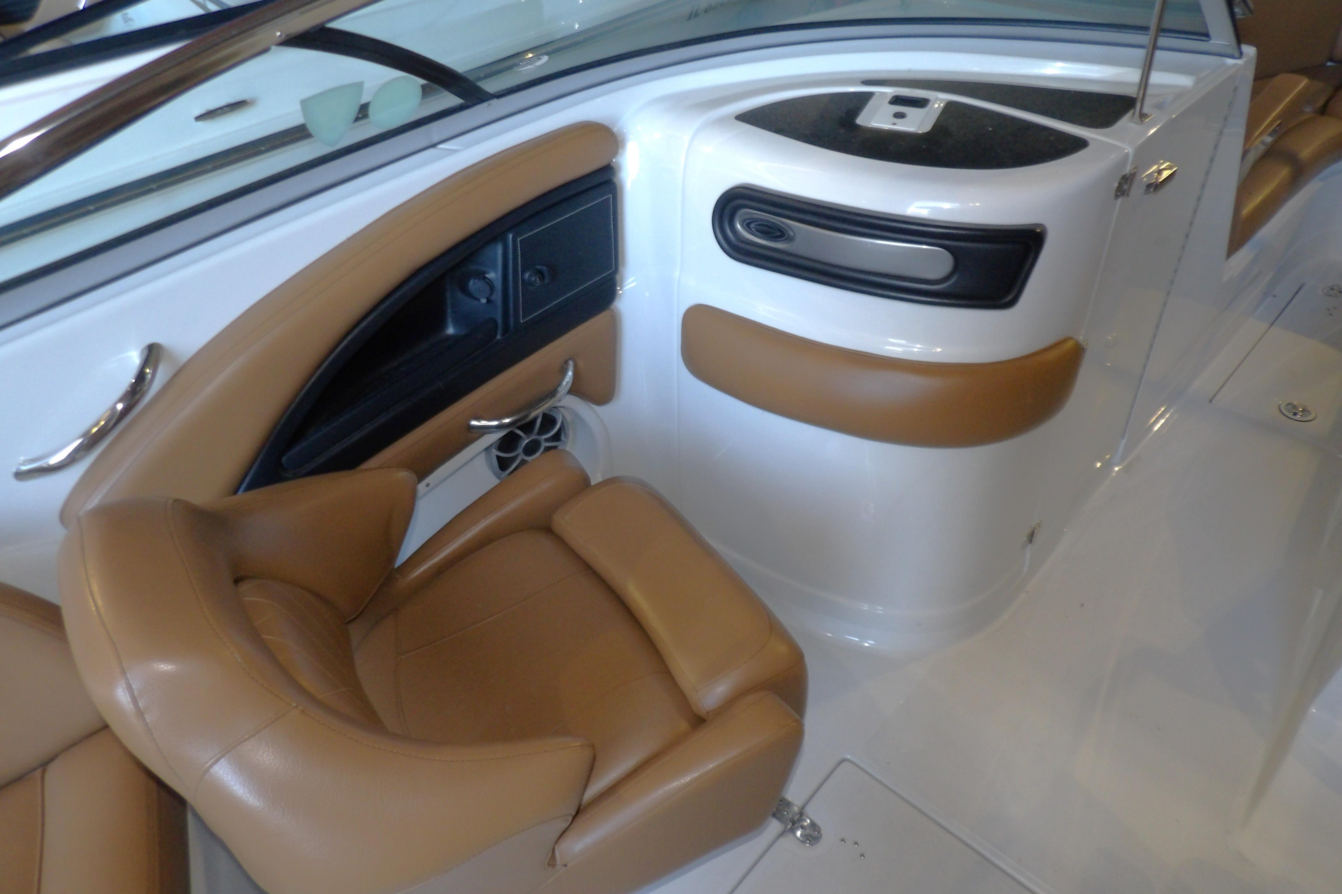 2023 Crownline 250 XSS boat interior with tan seating and sleek design.