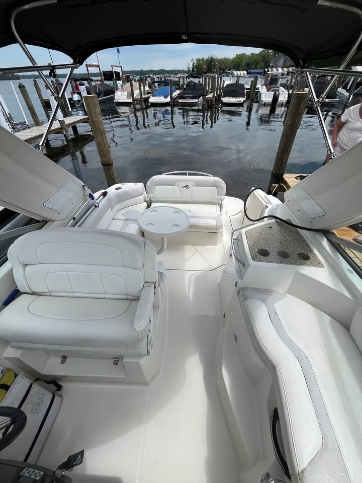 Interior of a 2011 Monterey 280SCR yacht docked at marina.