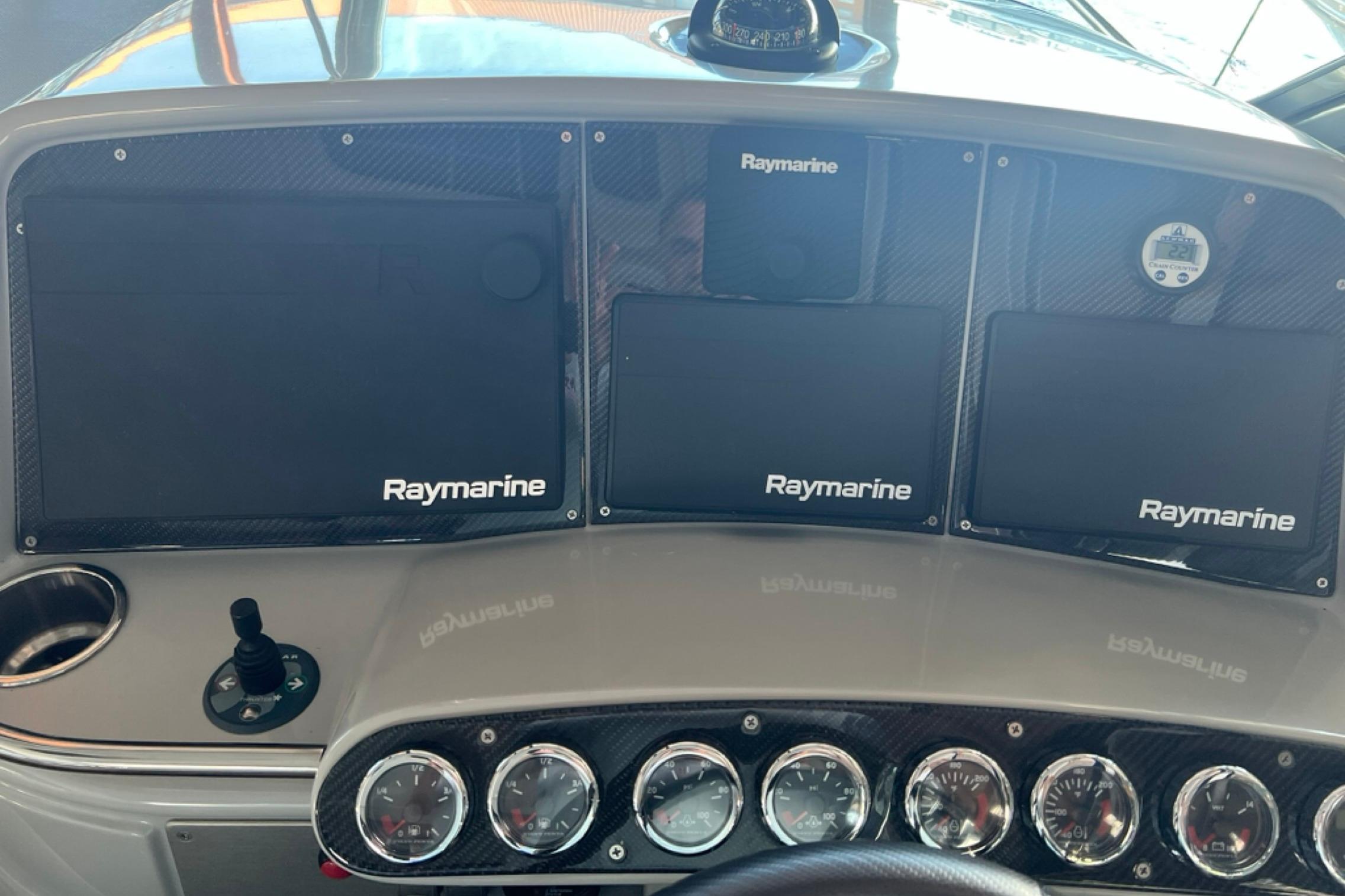 Dashboard of a 2008 Formula 400 Super Sport with Raymarine navigation displays.