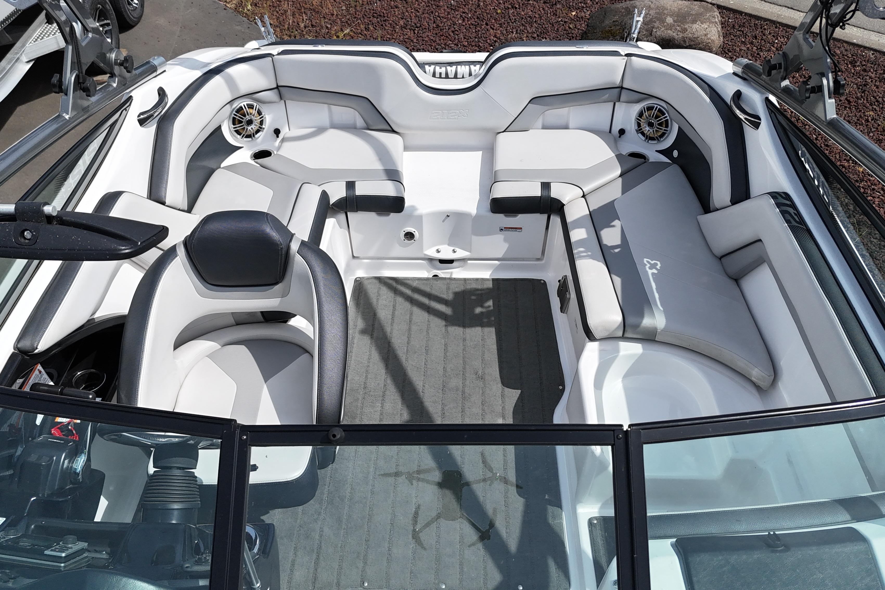 Interior view of a 2016 Yamaha Boats 212X, featuring sleek seating and modern design.