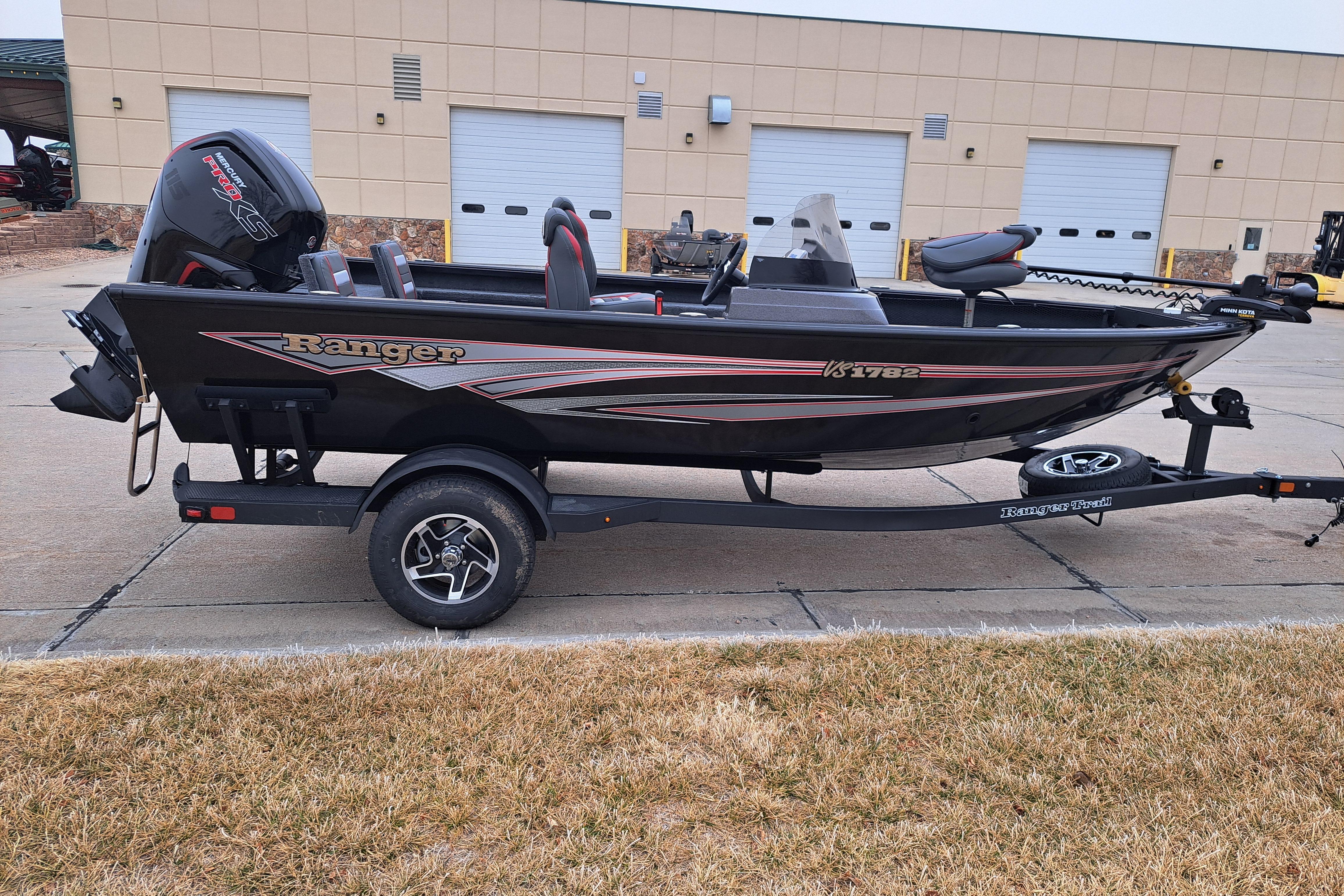 2026 Ranger VS1782SC Reata boat on trailer, parked outdoors near a building.