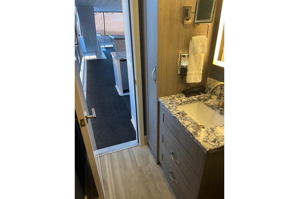 Modern bathroom with marble countertop on Adonia's 2021 "The Queen Elizabeth" model.