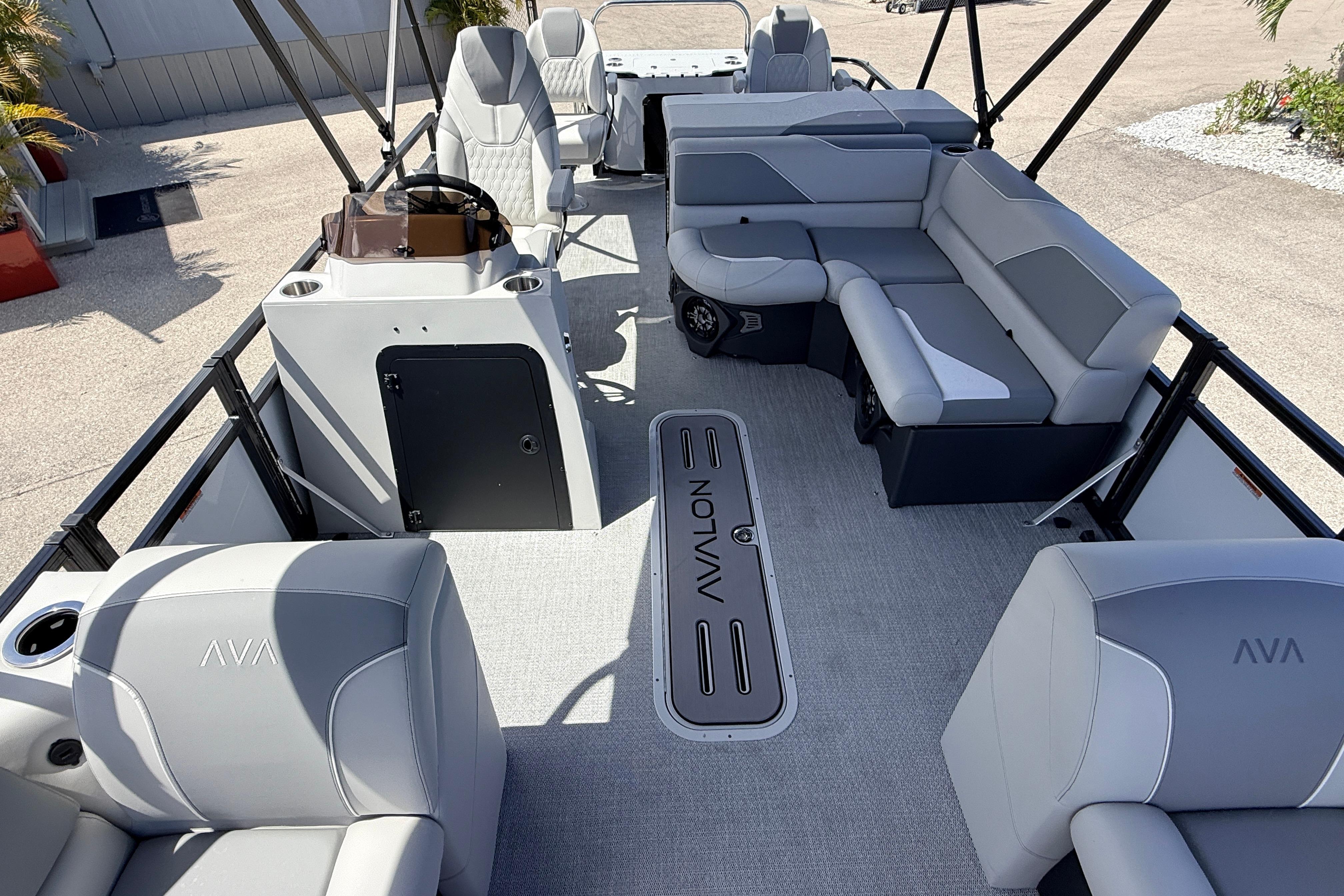 2026 Avalon 2385 Venture 85 Tri Toon boat interior with gray seating and modern design.