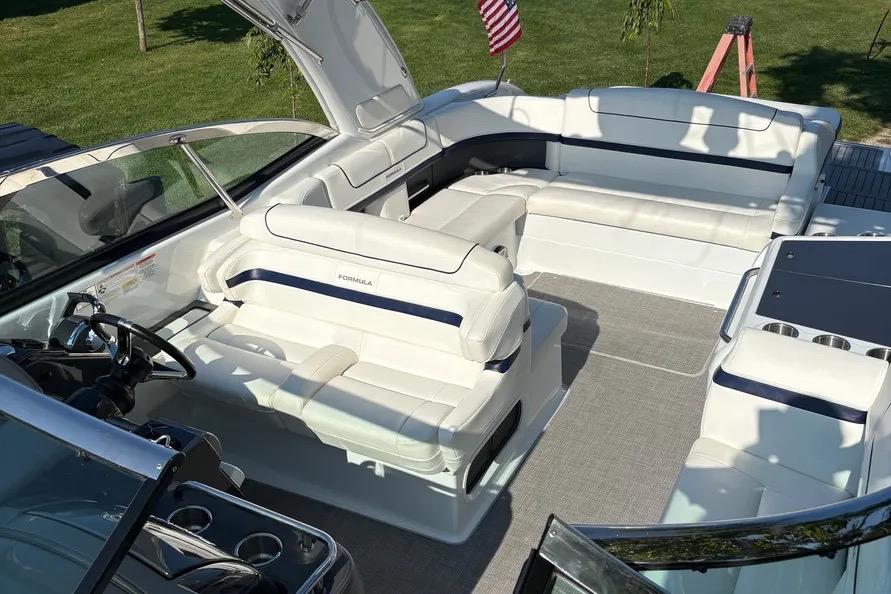 2015 Formula 350 Crossover Bowrider with spacious white seating and sleek design.