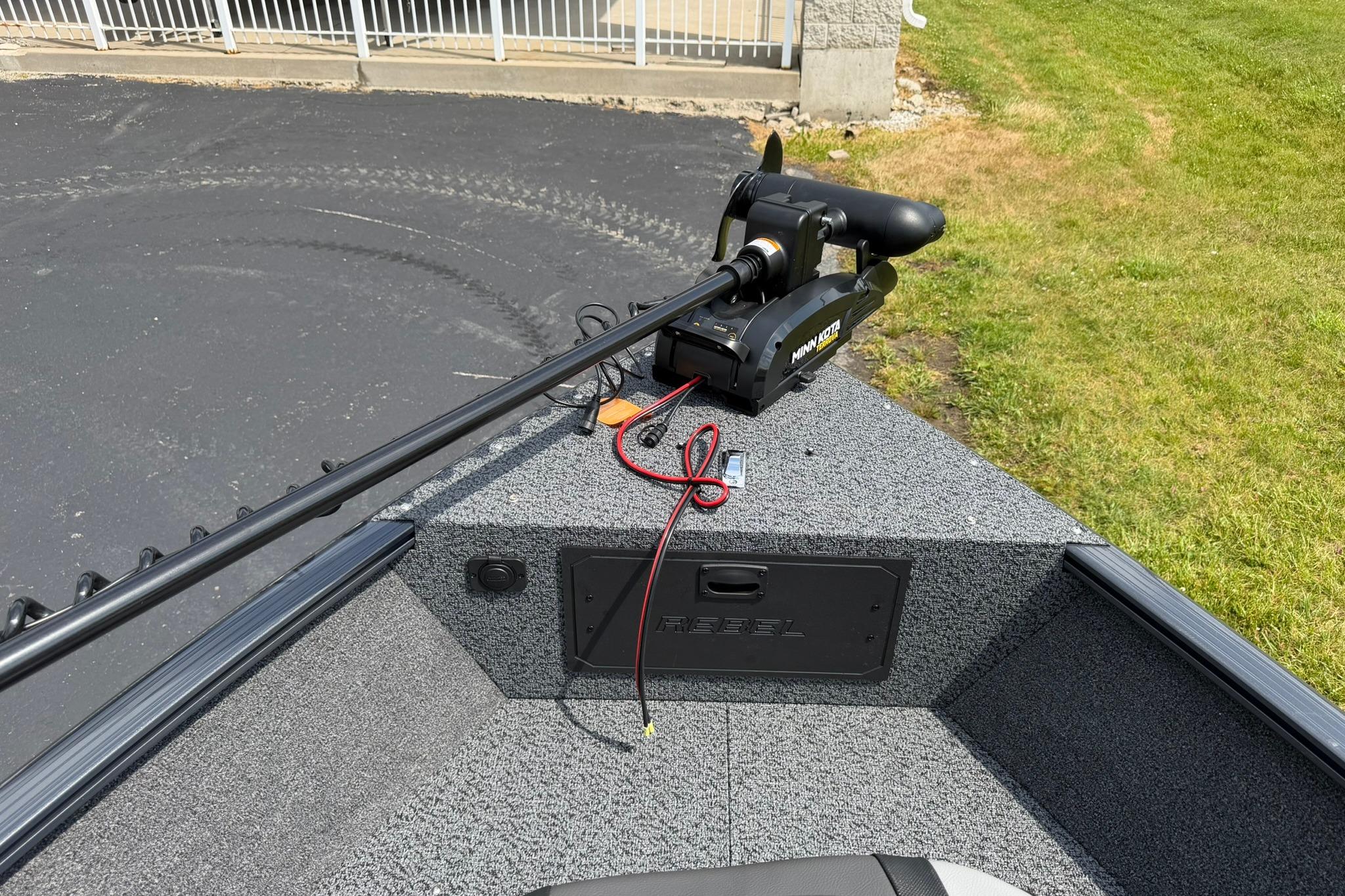 2027 Lund 1650 Rebel XL SS boat with Minn Kota trolling motor on deck.