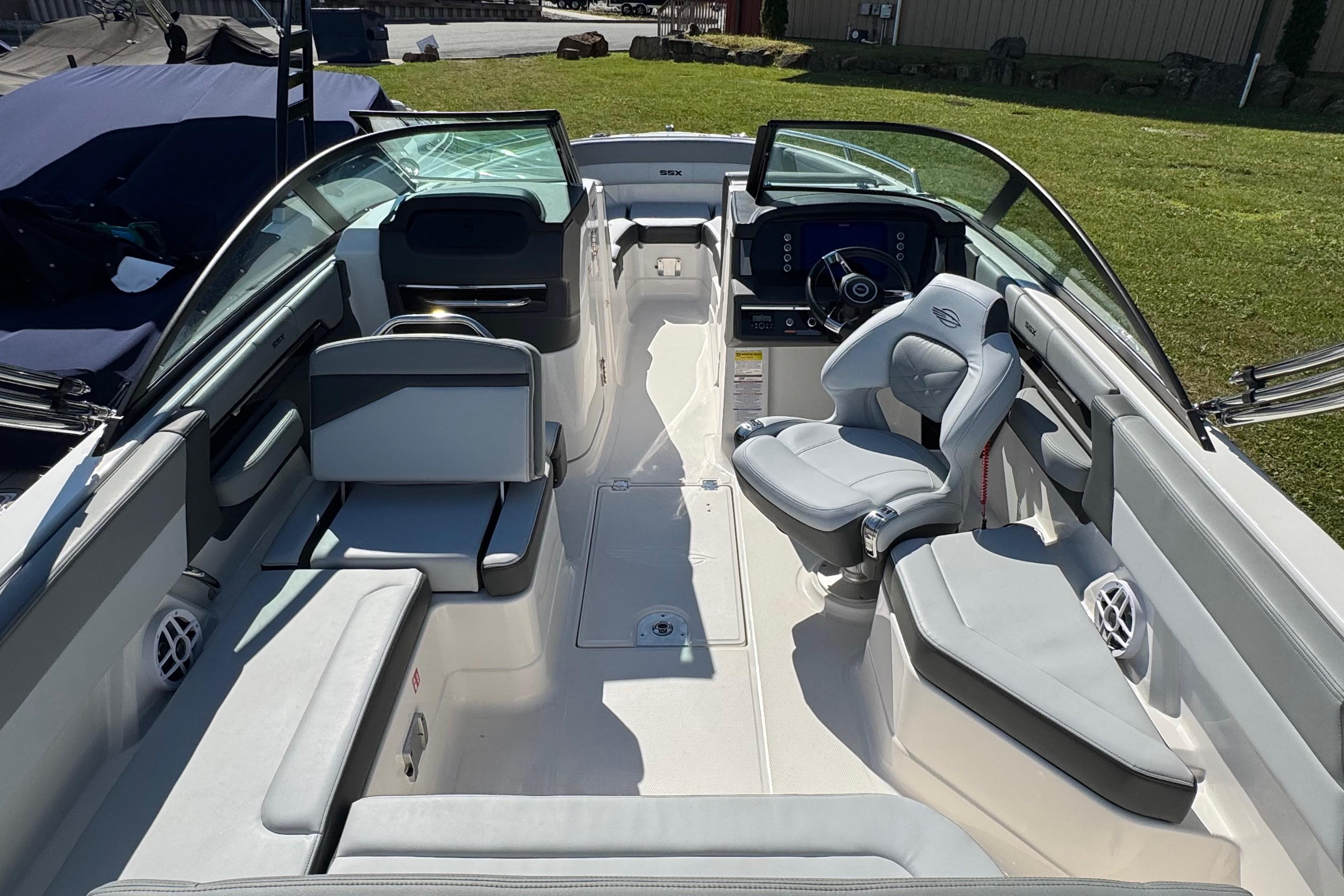 2026 Chaparral SSX 4 boat interior with modern seating and steering wheel.