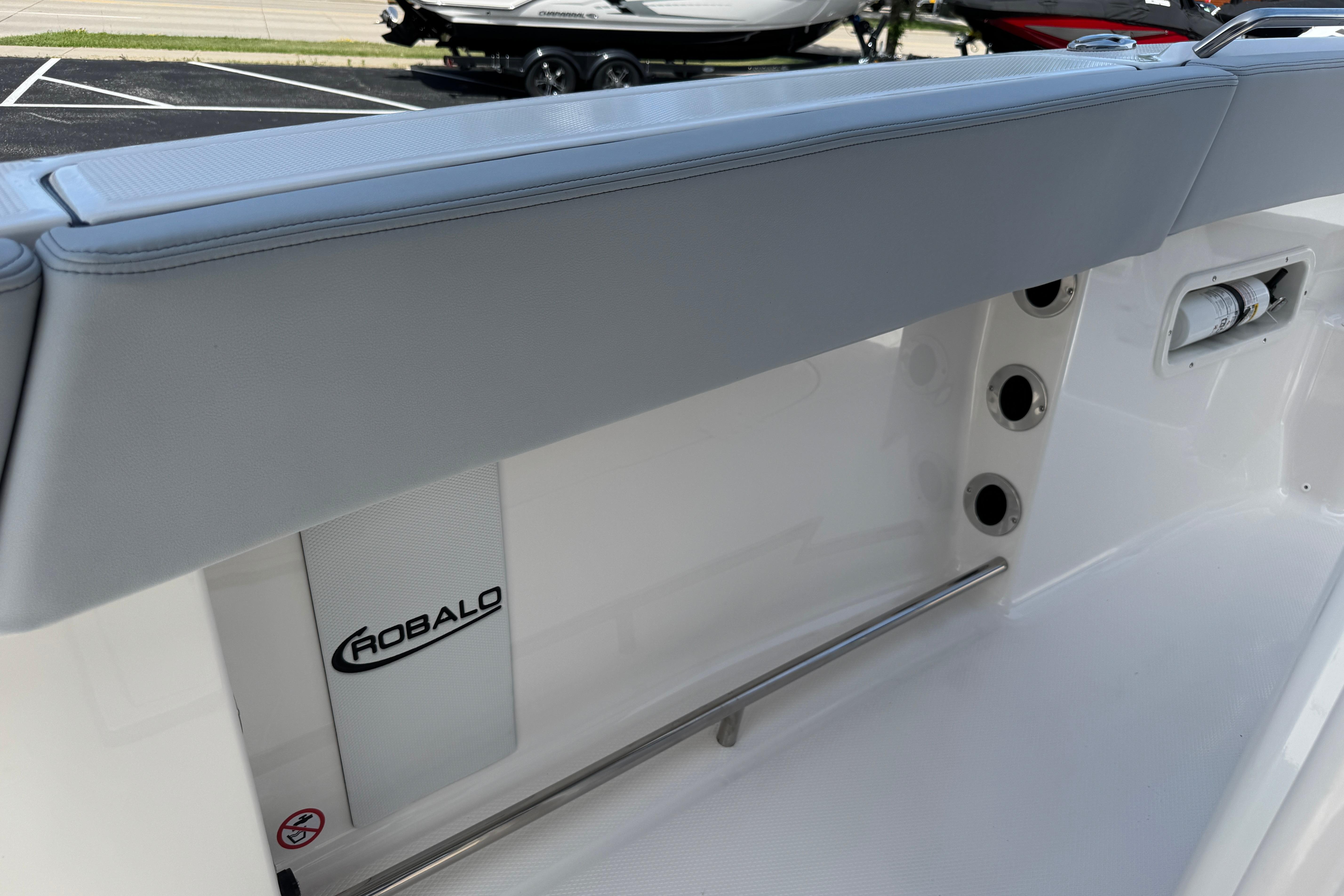 2026 Robalo R250 Center Console boat interior with sleek seating and storage features.
