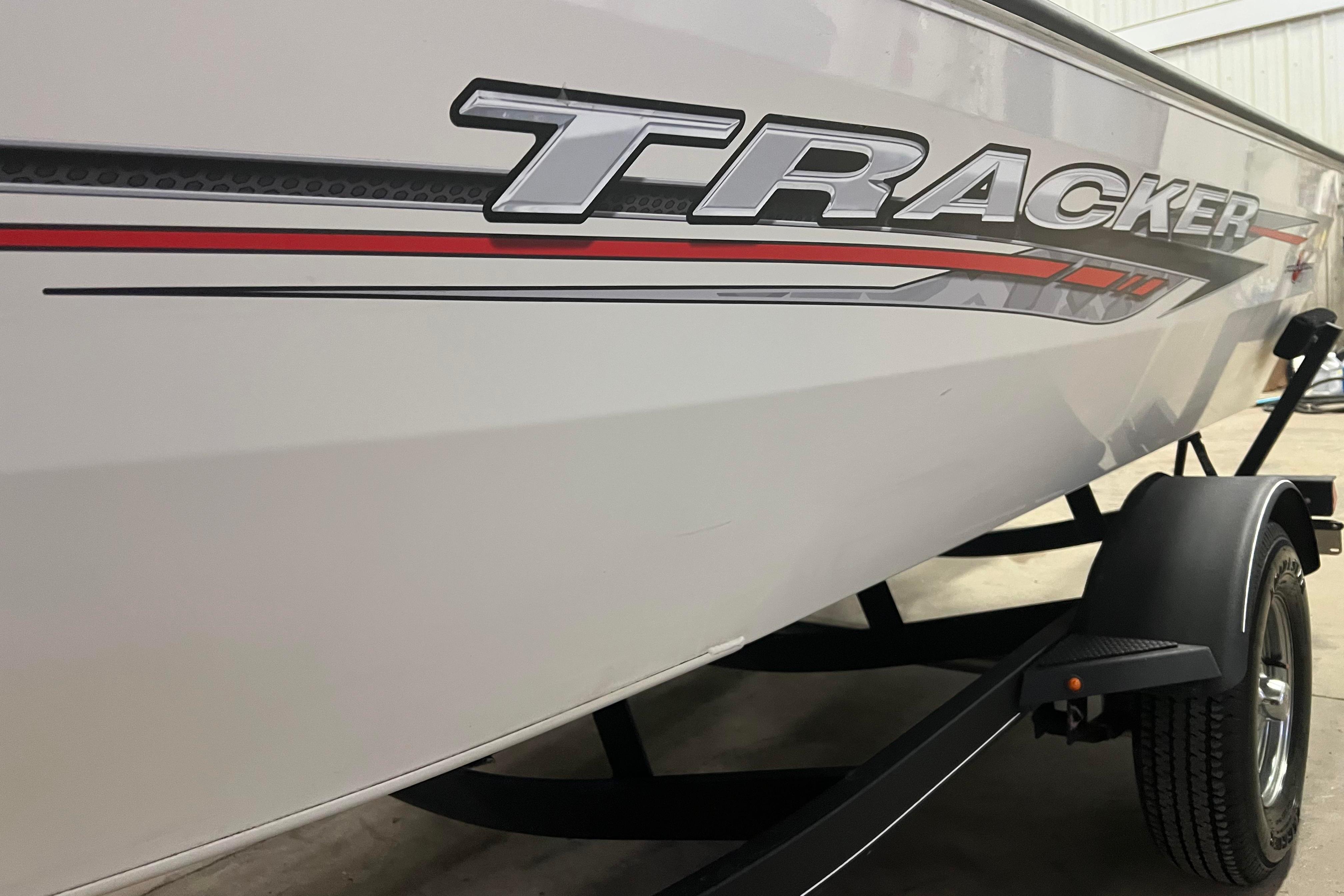 2022 Tracker Pro Guide V-16 WT boat on trailer, side view.