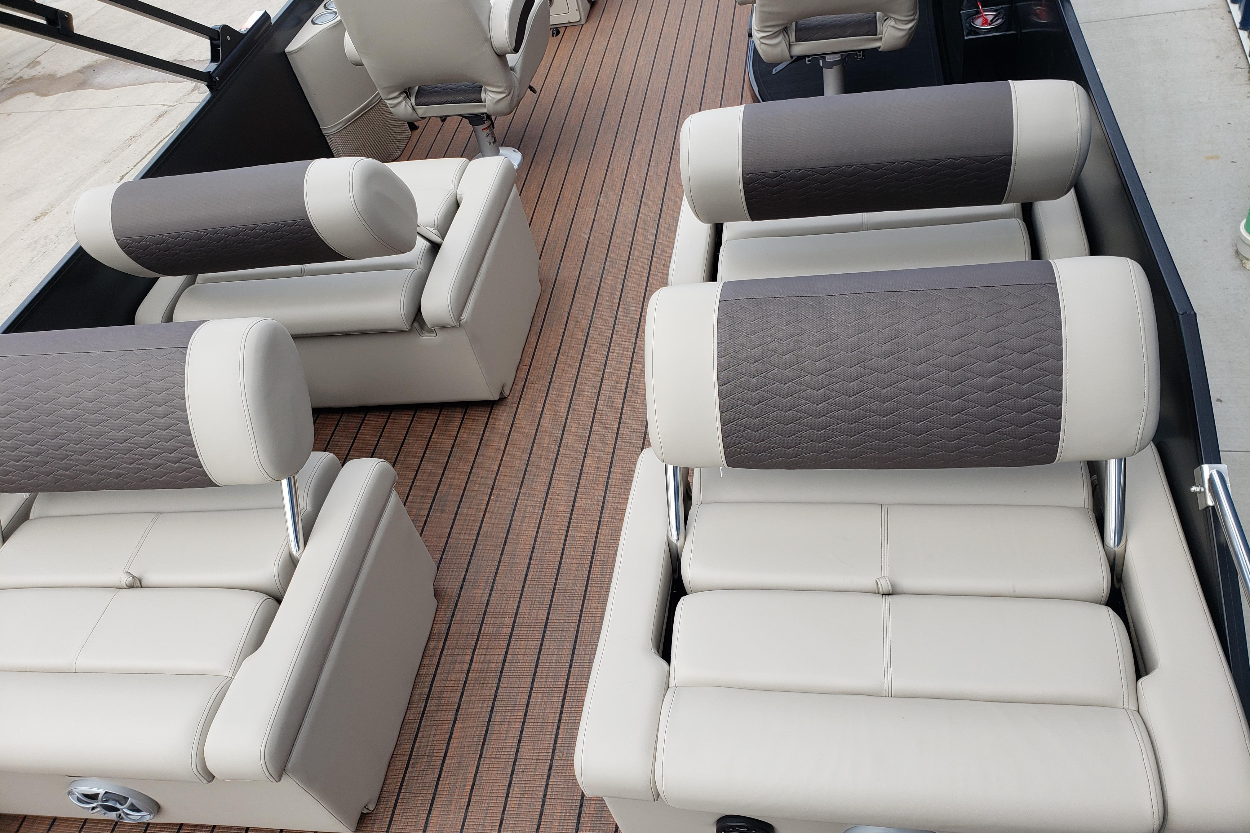 Luxurious seating on 2026 Bentley Pontoons Elite 253 QSB with elegant upholstery.