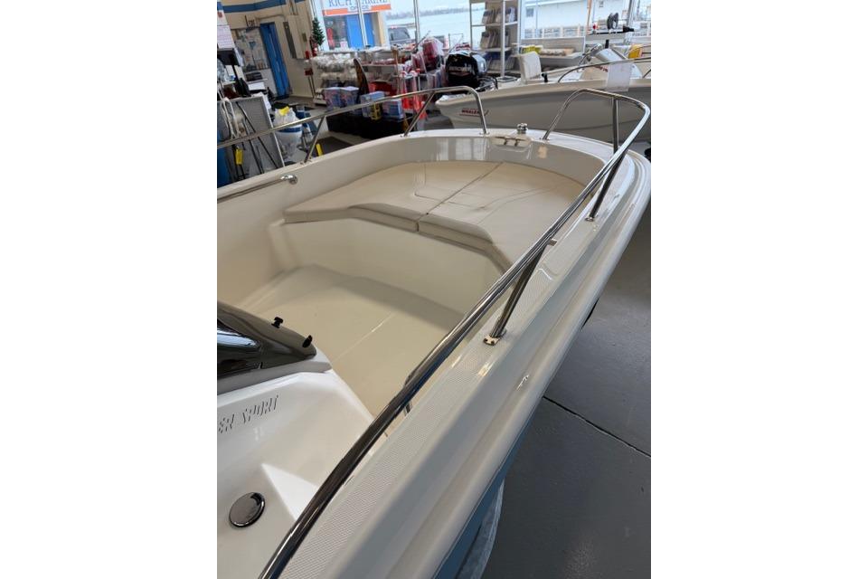 2026 Boston Whaler 160 Super Sport boat interior with cushioned seating.
