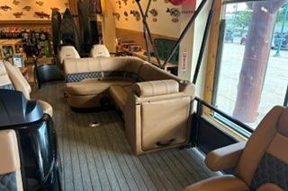 Luxurious interior of 2026 Ranger 220FC boat with plush seating and modern design.