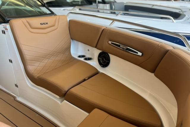 2025 Chaparral 247 SSX boat interior with tan leather seating and sleek design.
