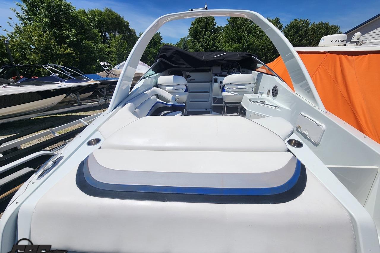2008 Baja 335 Performance boat with sleek white interior and spacious seating.