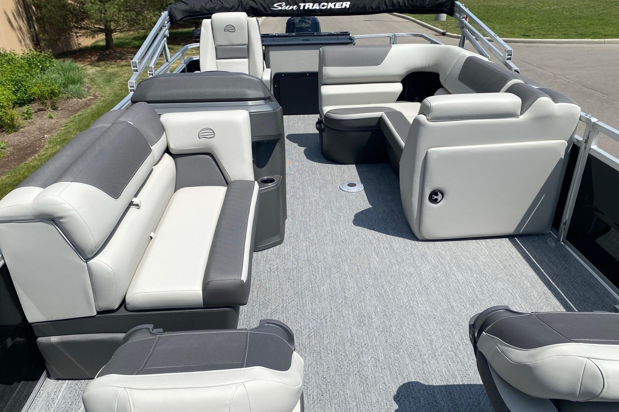 2026 Sun Tracker Fishin' Barge 20 DLX interior with spacious seating and modern design.
