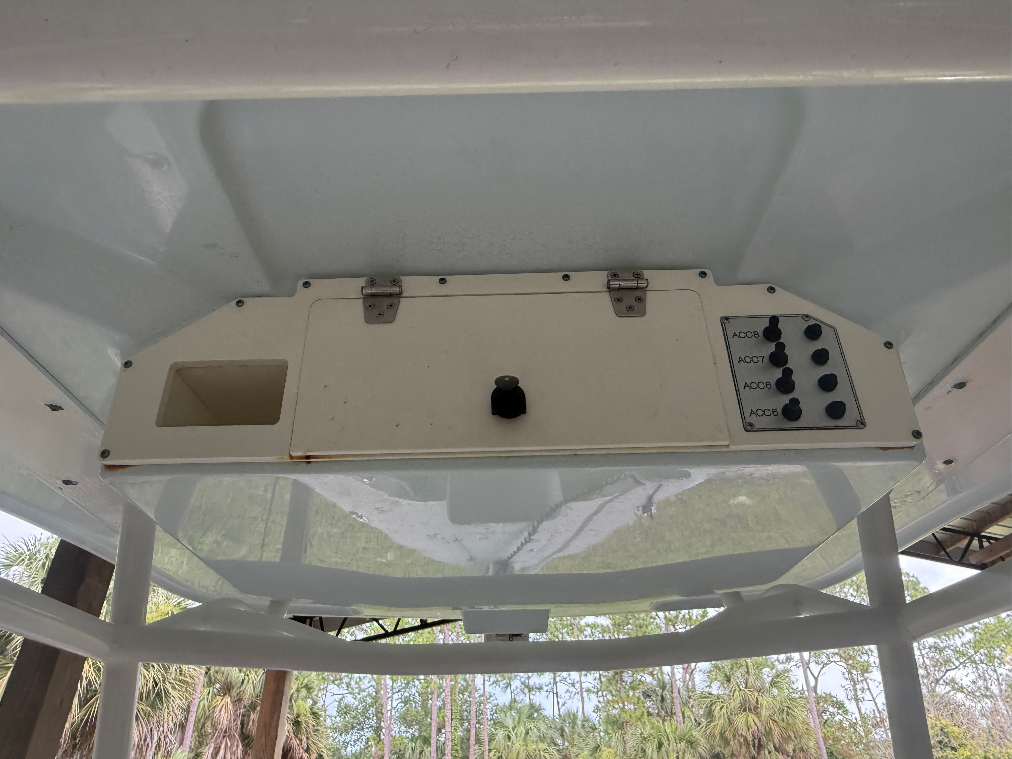 The image shows the helm console of a 2021 Clearwater 2508 Center Console boat.