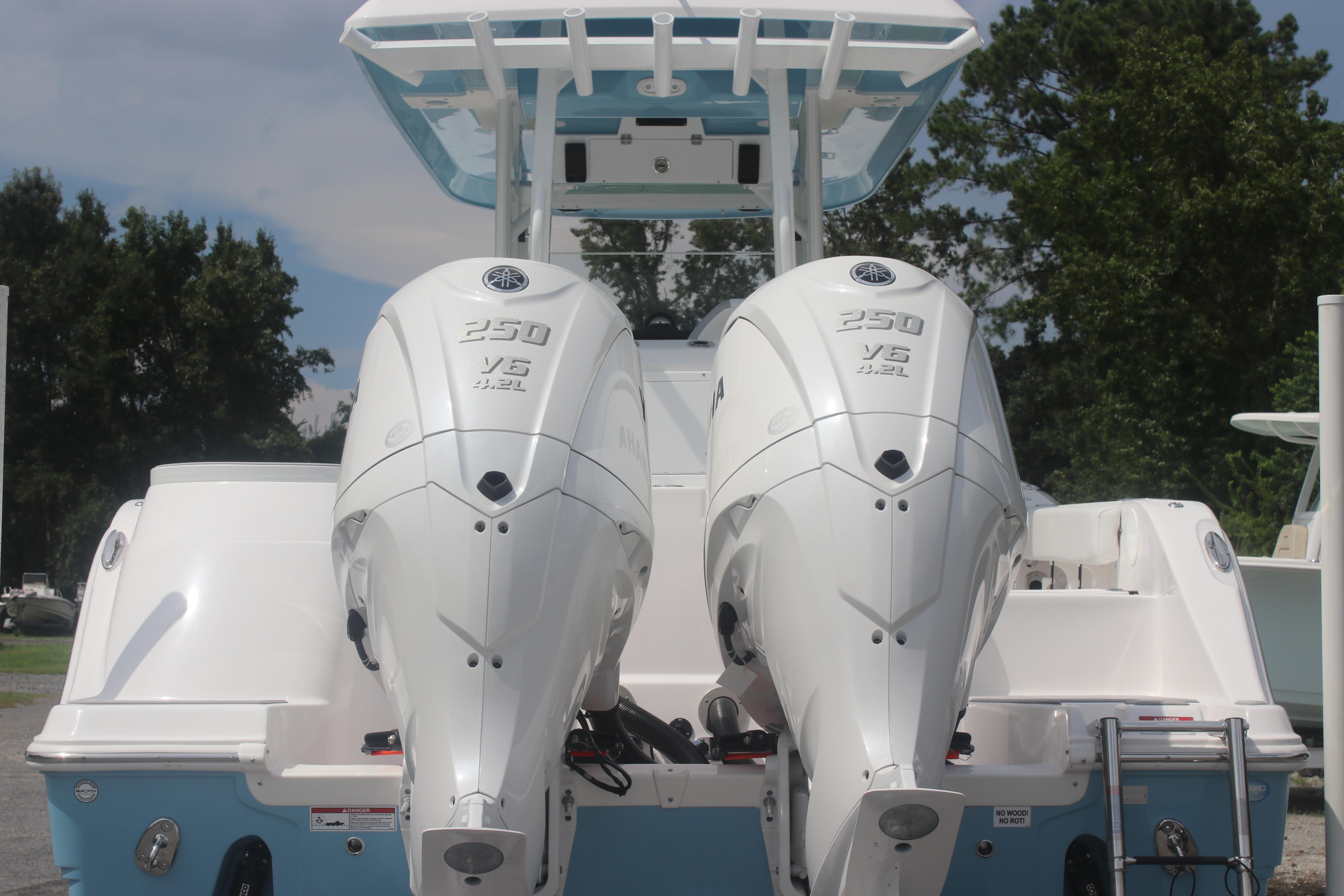 2026 Sea Fox 288 Commander with twin Yamaha 250 V6 engines, rear view.