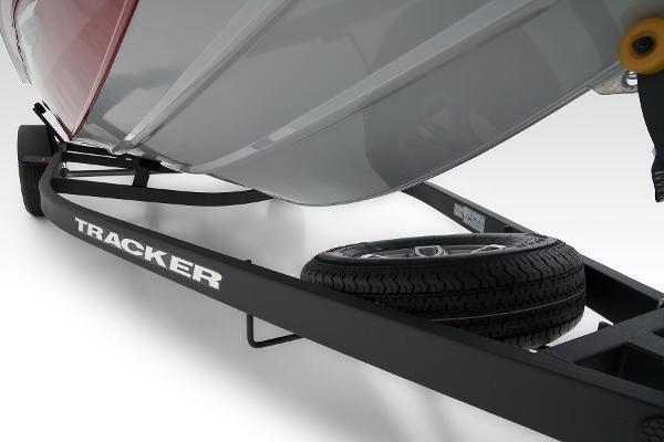 Manufacturer Provided Image: 2025 Tracker Pro Team 195 Tournament Edition boat on trailer, showcasing hull and wheel detail.