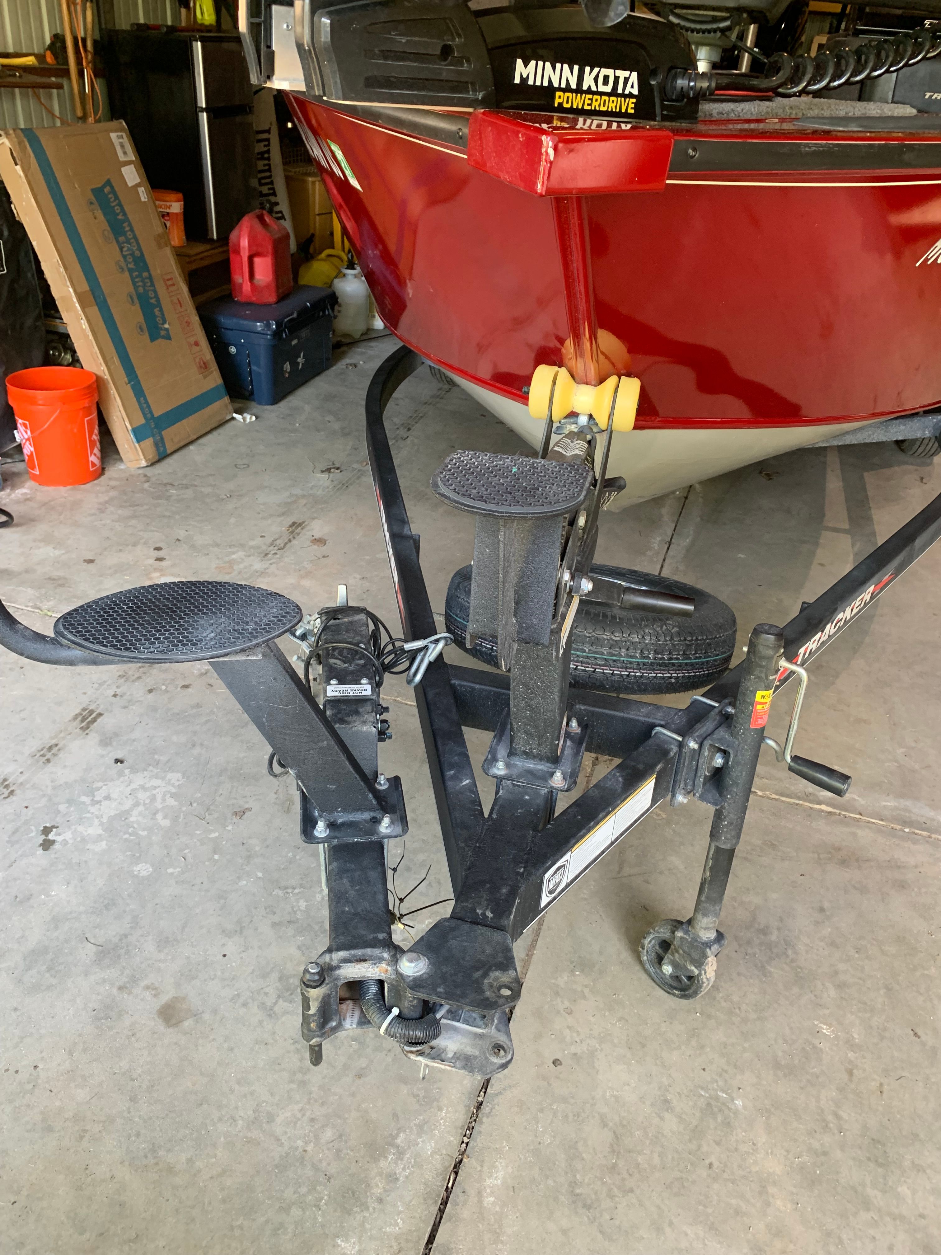 2022 Tracker Targa V-19 WT boat on trailer in garage.