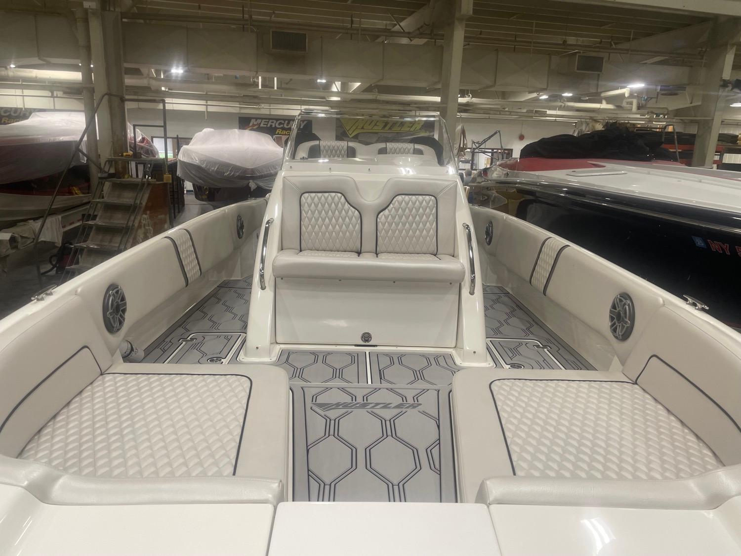 2025 Hustler 25 C3 Speedfish boat interior with luxurious seating and modern design.