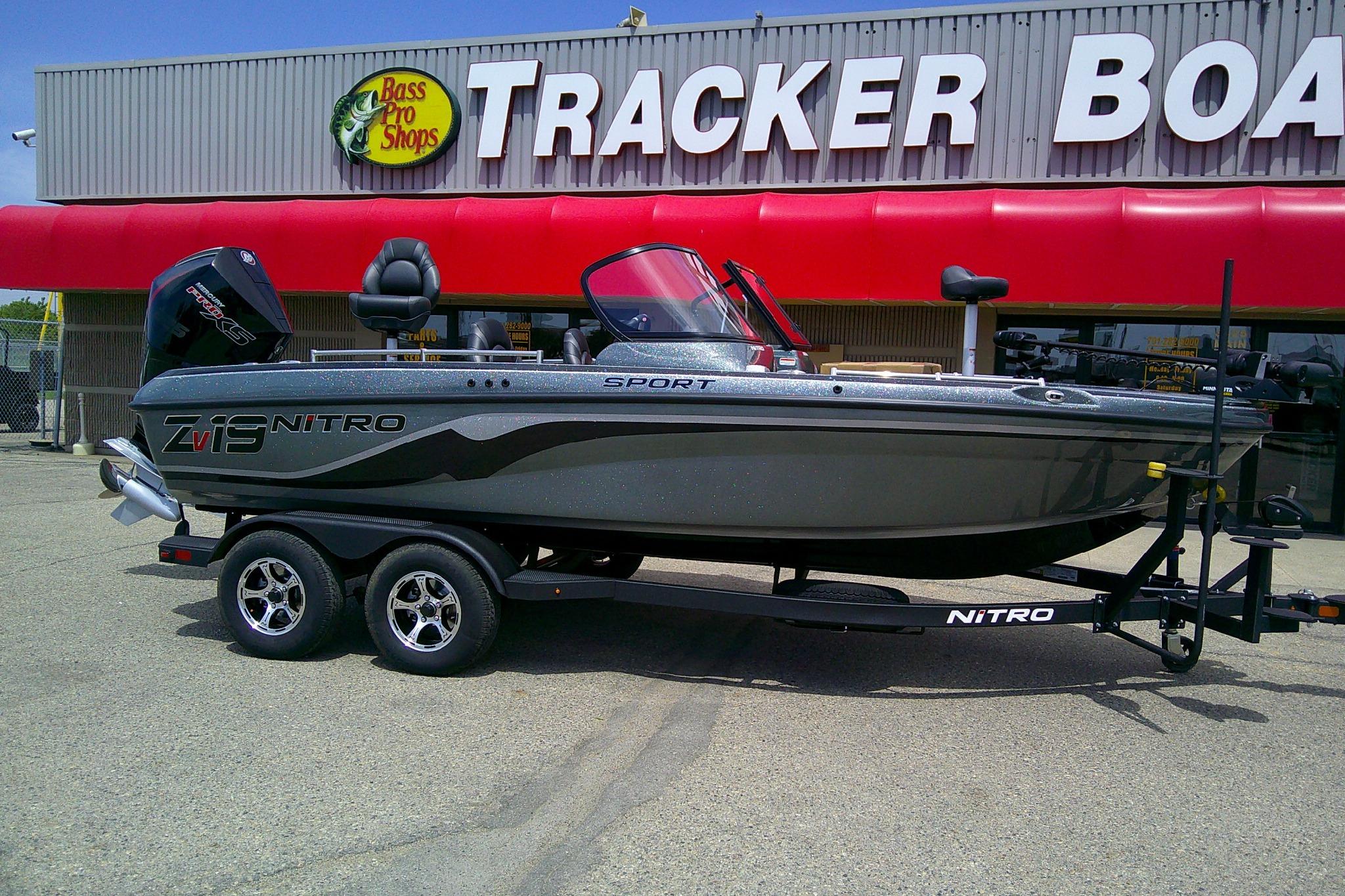 2026 Nitro ZV19 Sport boat on trailer outside Bass Pro Shops.