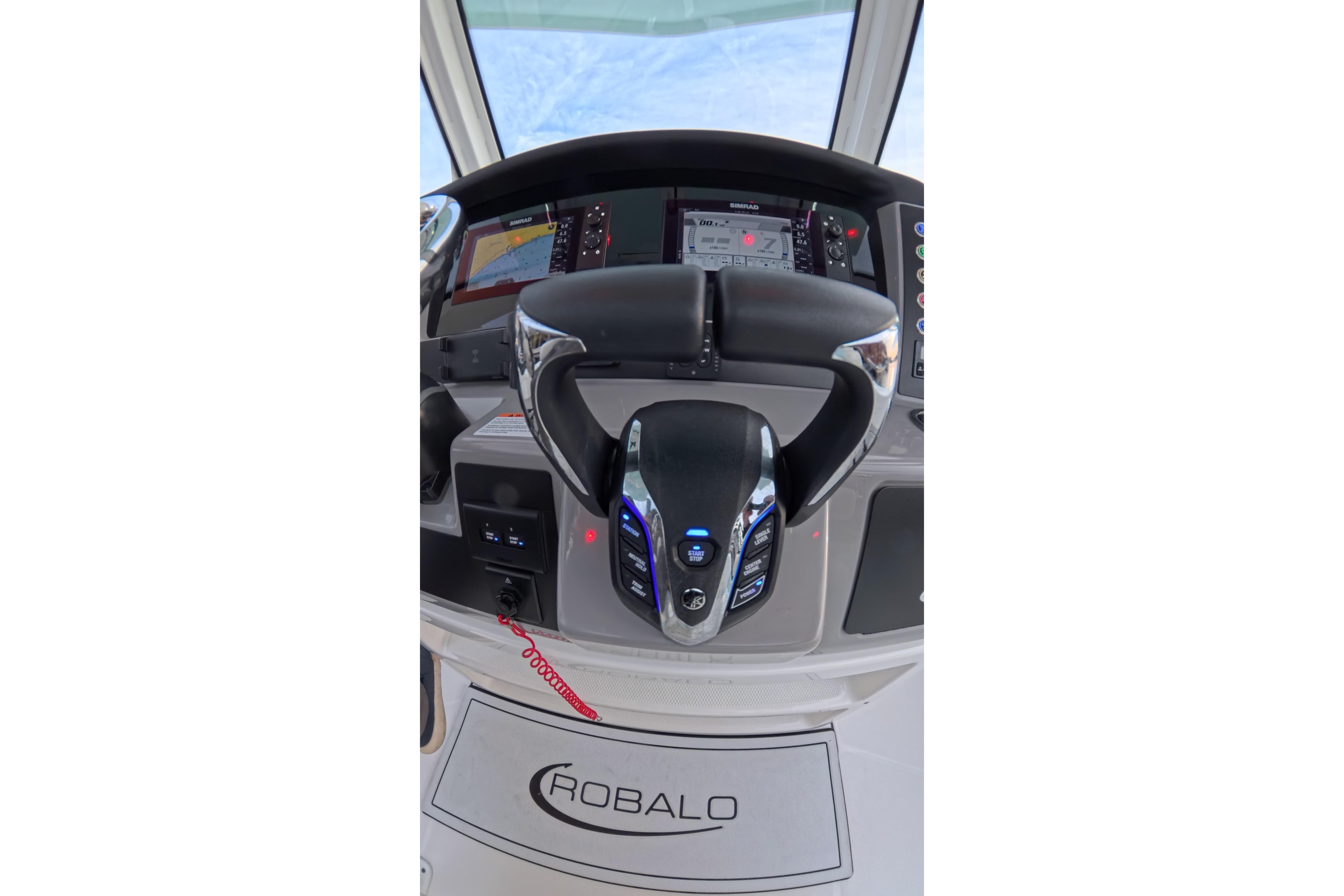 2025 Robalo R250 Center Console helm with advanced controls and navigation display.