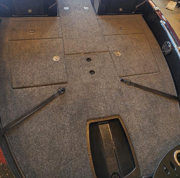 2024 Nitro ZV21 boat interior with carpeted deck and storage compartments.