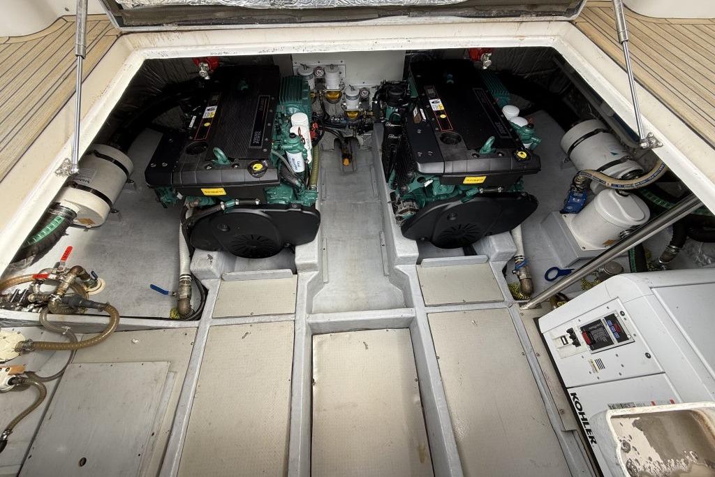 Engine room of 2012 Sasga Yachts Menorquin 42 with dual engines and equipment.