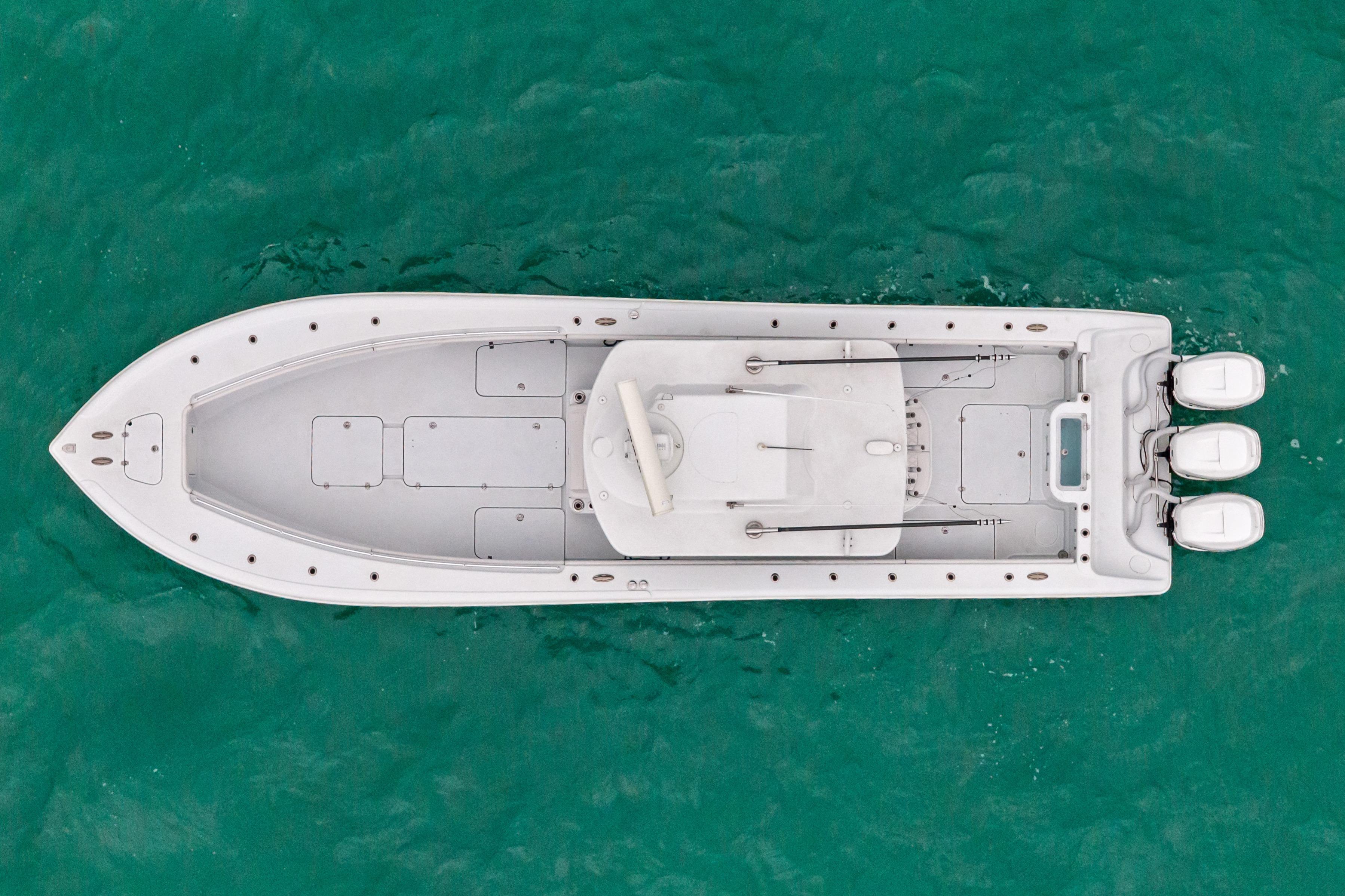 Top view of 2021 Yellowfin 36 Offshore boat on turquoise water.