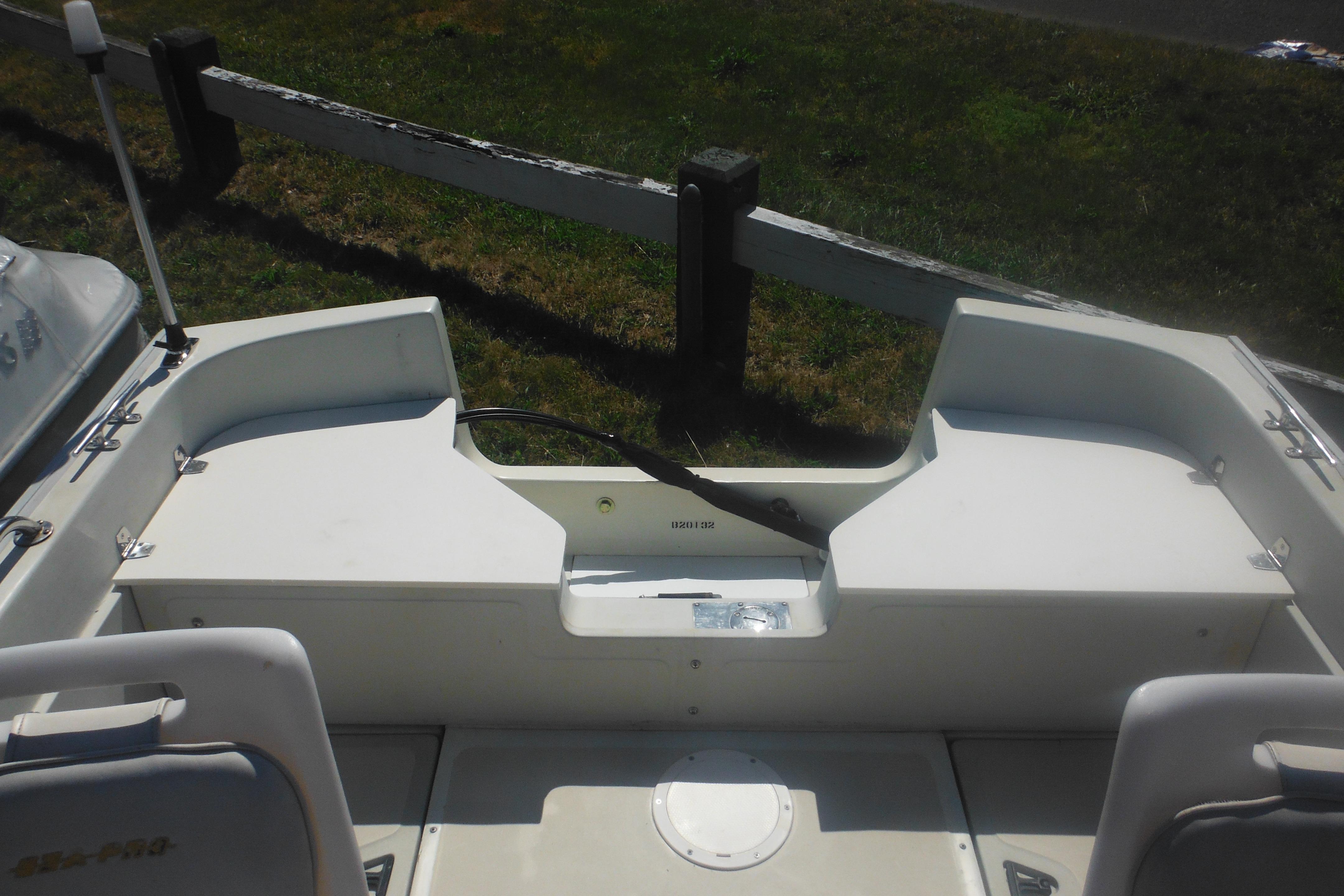 1991 Boston Whaler 16 SL boat interior with seating and storage compartments.