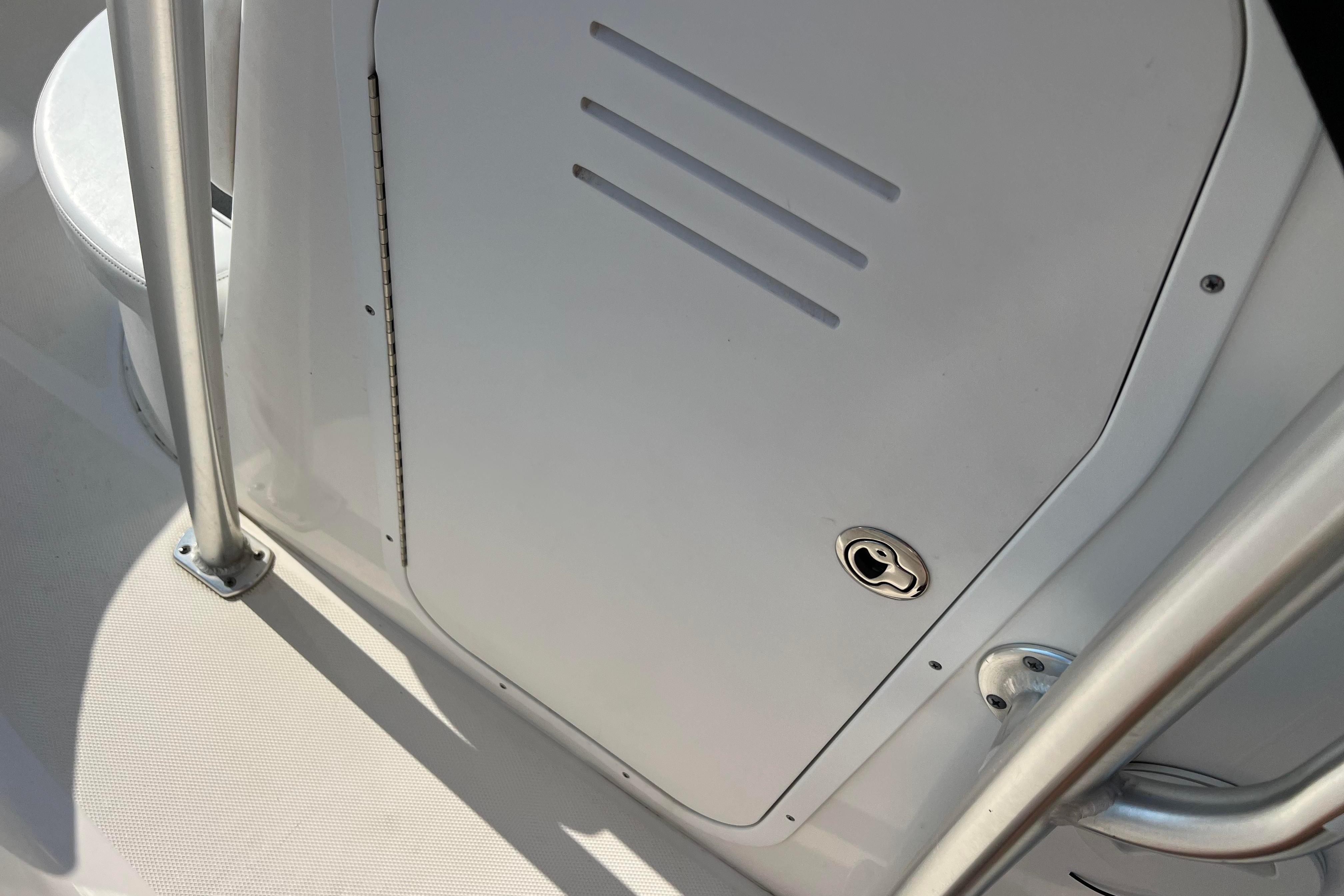 2012 Sea Fox 206 Center Console boat hatch with stainless steel railing.