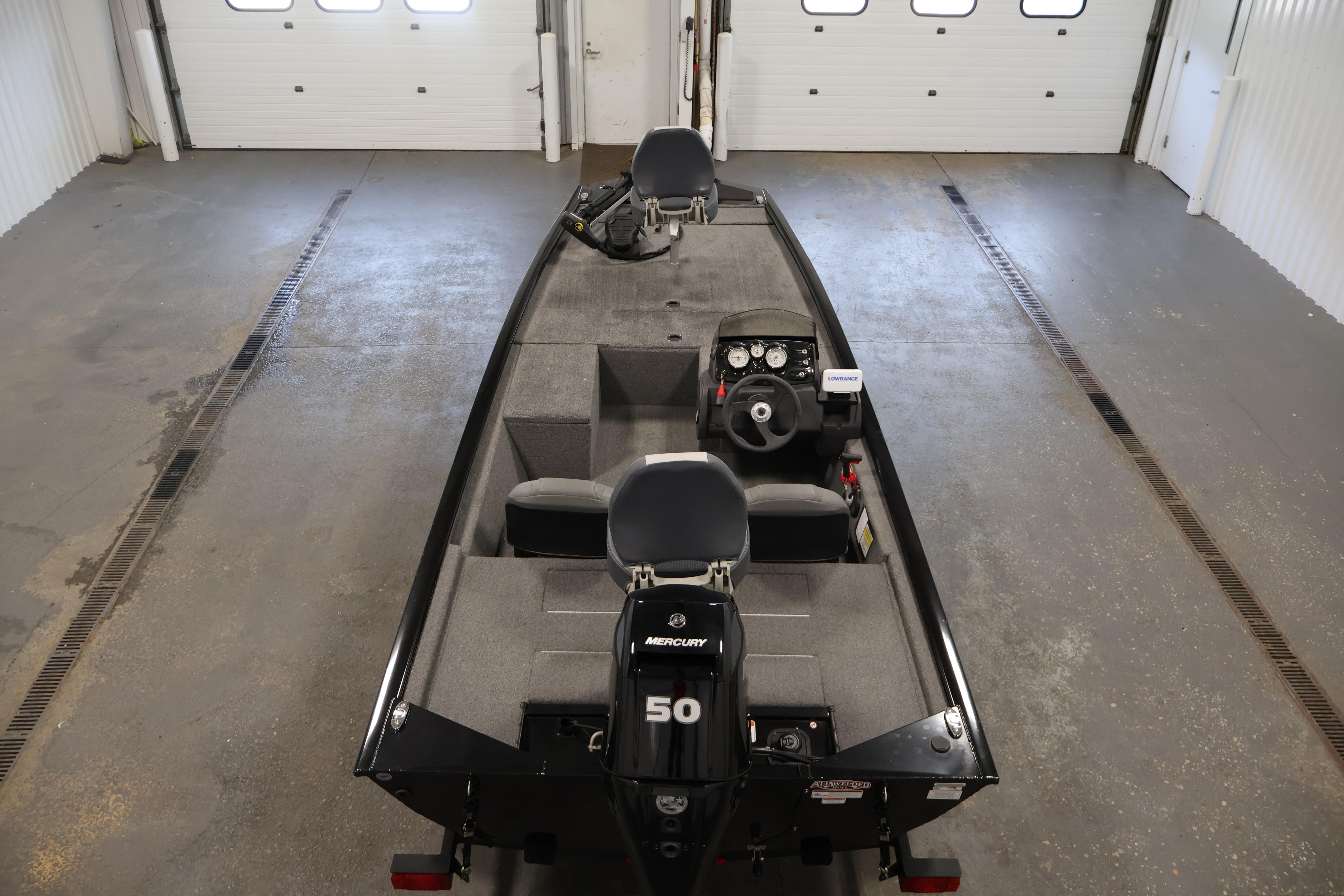 2024 Tracker Pro 170 boat in a garage, featuring a Mercury 50 engine.