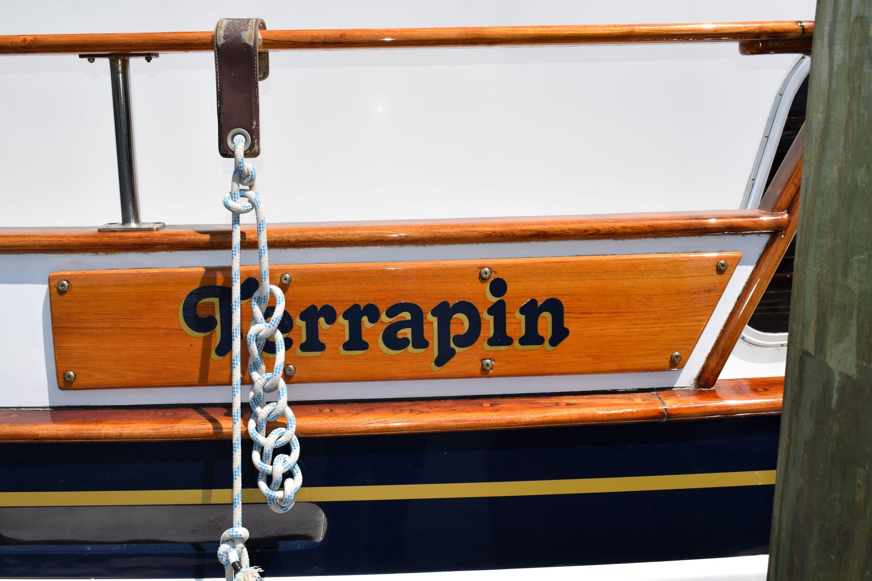 Wooden nameplate "Terrapin" on 1980 Cheoy Lee 52 Motorsailer boat.