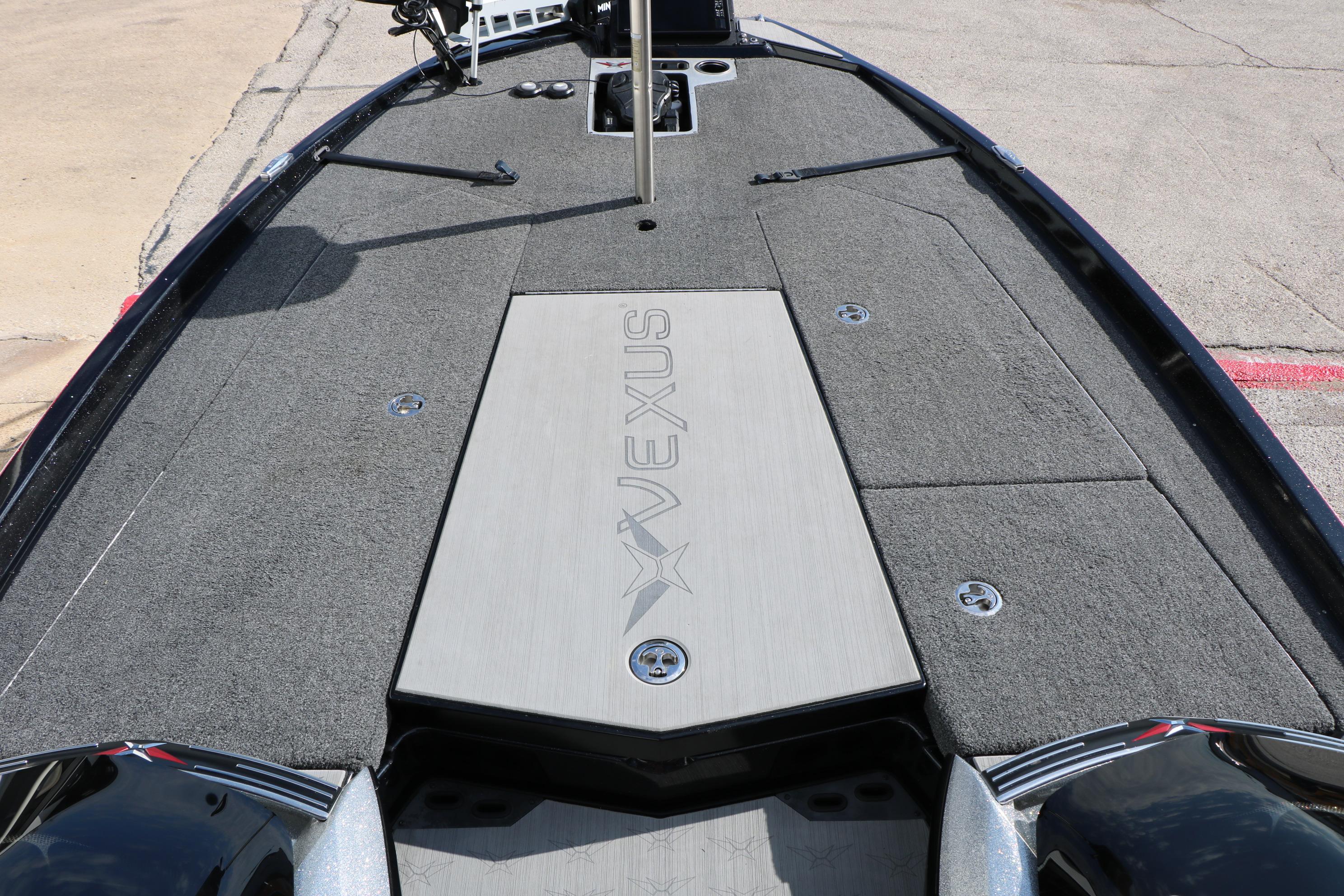 2022 Vexus VX21 boat deck with carpeted surface and storage compartments.
