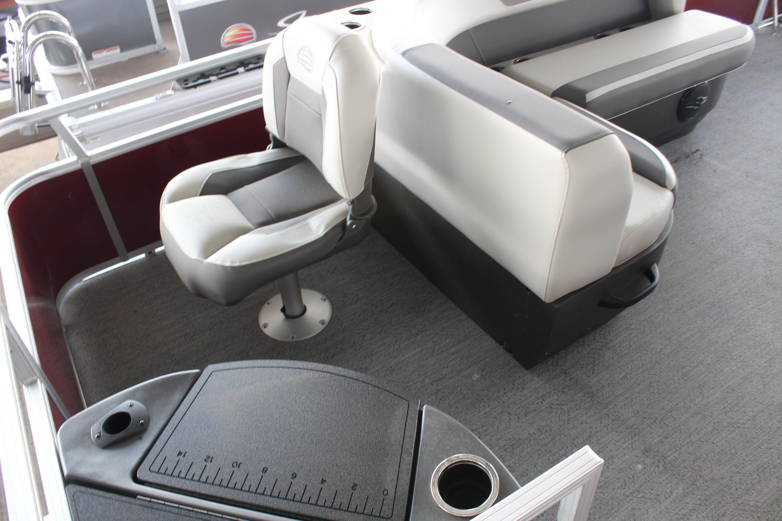 2026 Sun Tracker Bass Buggy 18 DLX interior with seating and fishing station.