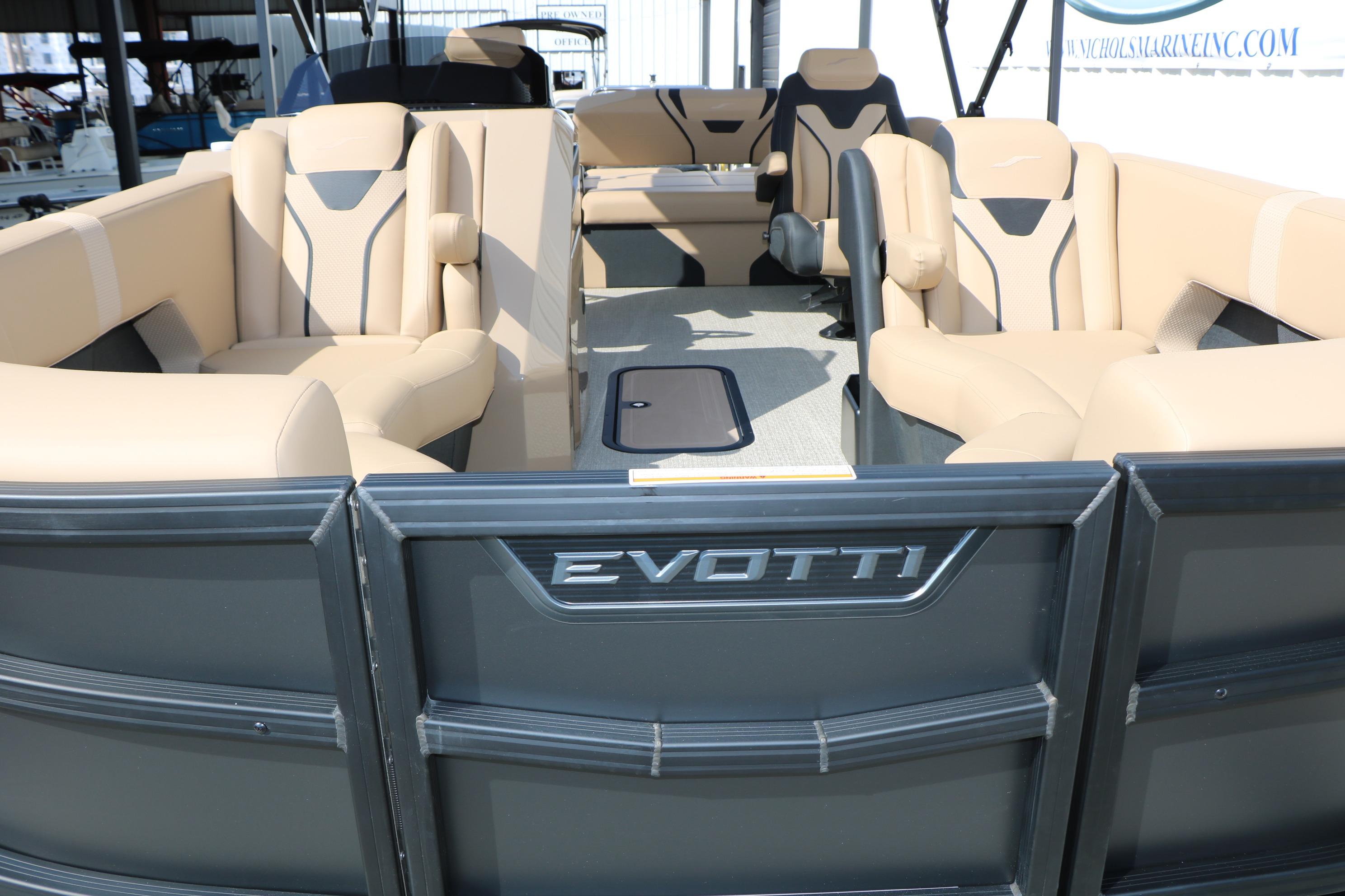 2026 Evotti 723CS pontoon boat with beige seating and modern design.