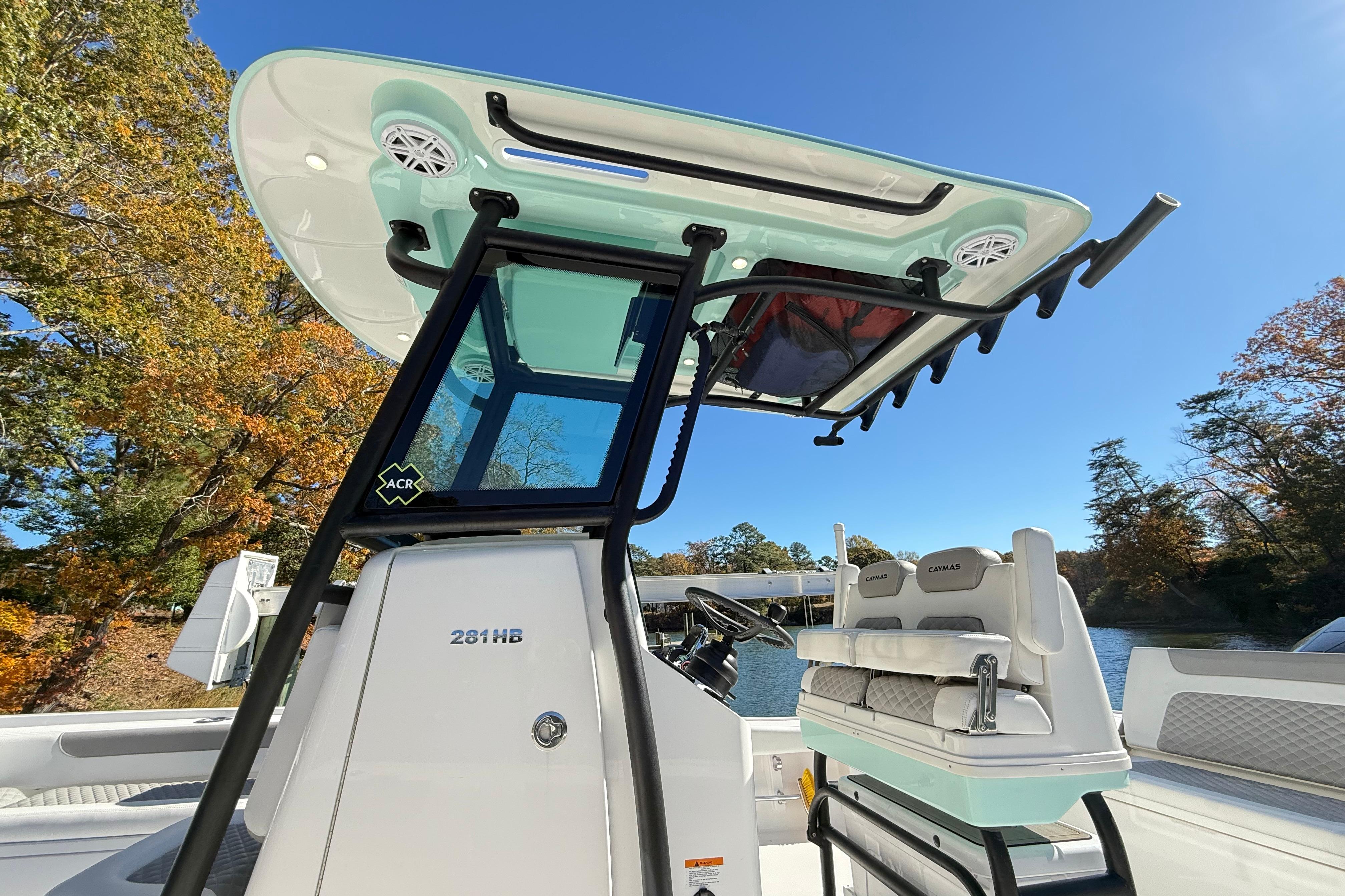 2023 Caymas 281 HB boat with sleek design and modern features on a sunny day.