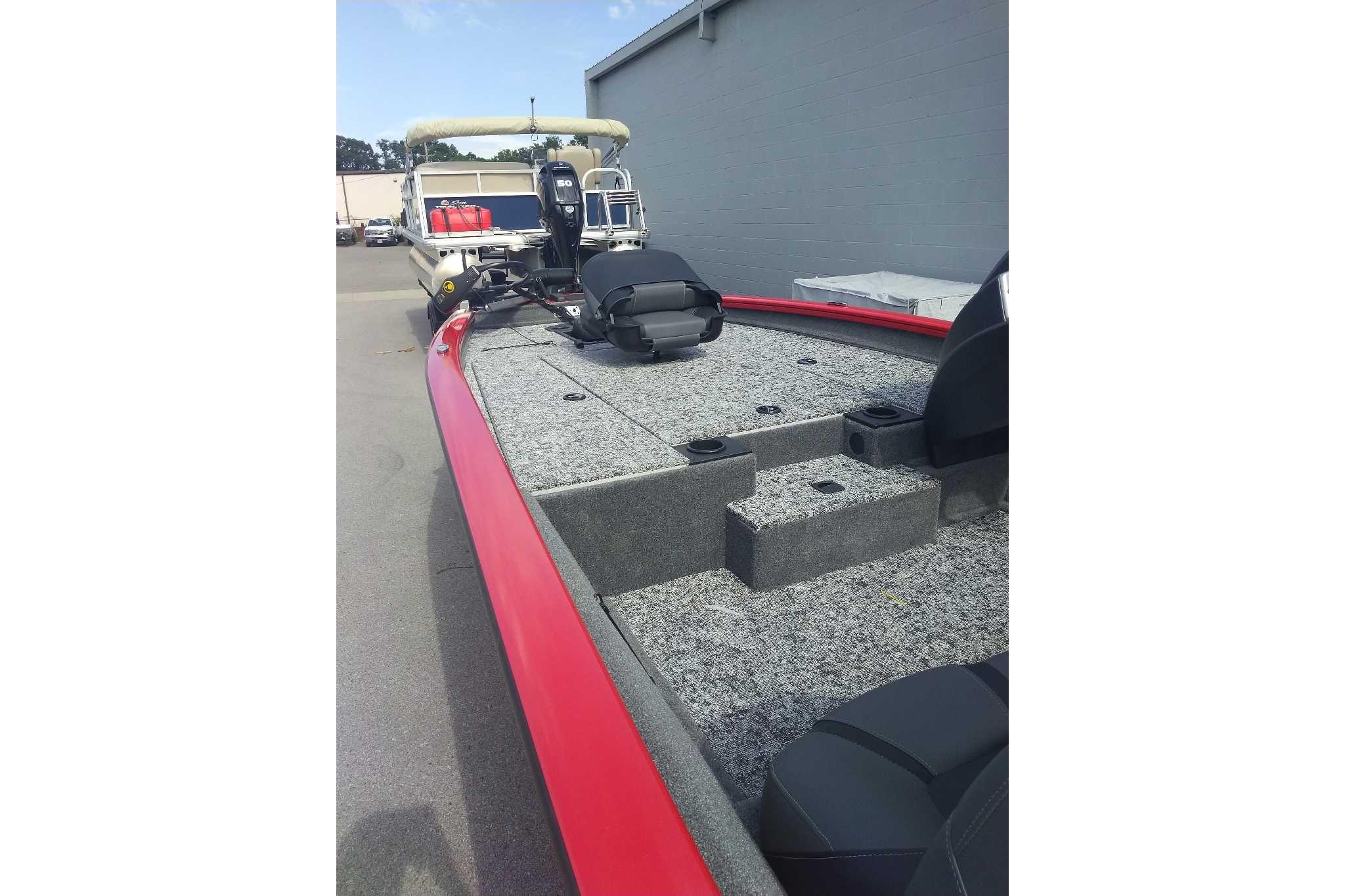 2026 Tracker Pro Team 190 boat with red trim and spacious deck.